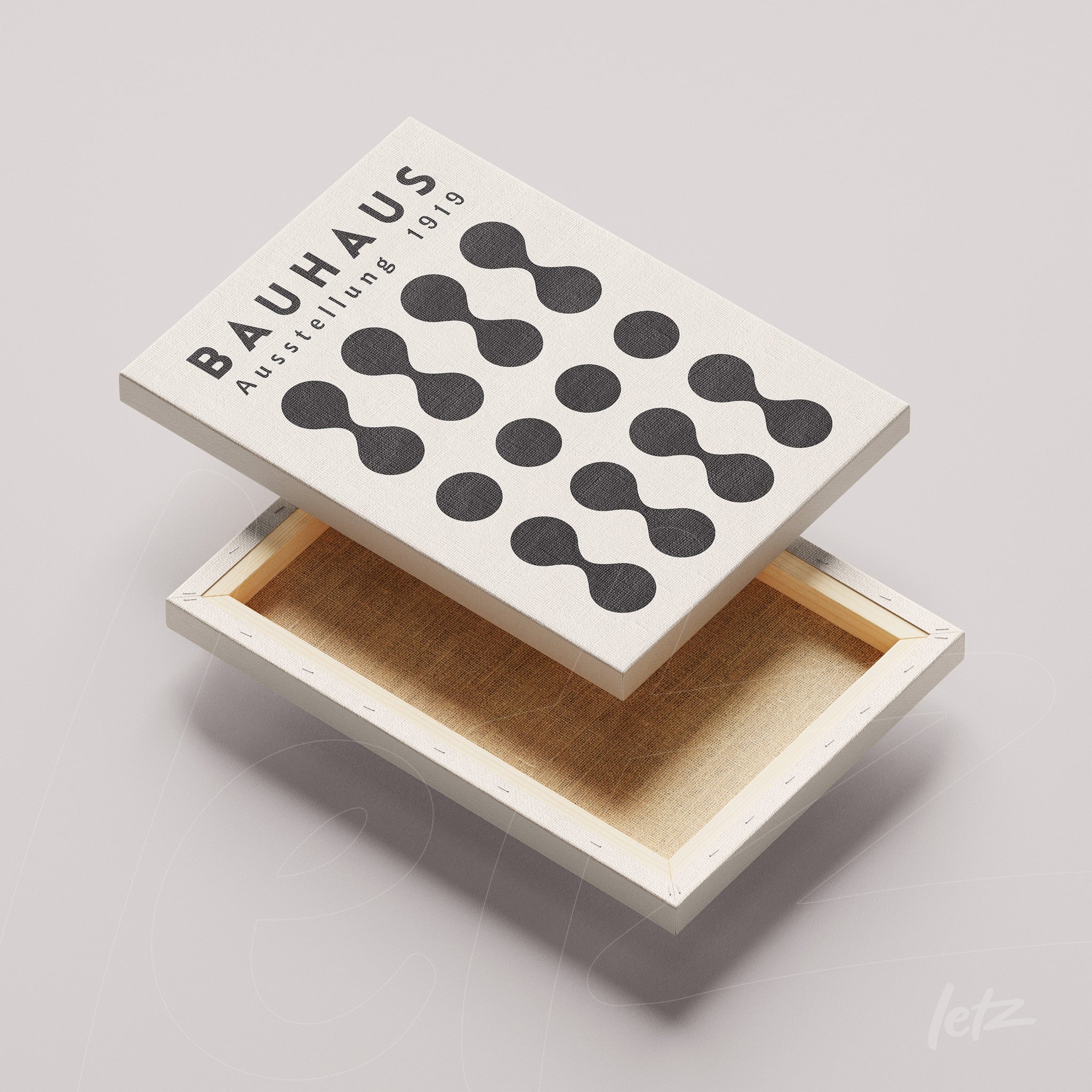 canvas wall art in bauhaus style featuring black geometric patterns on a white background