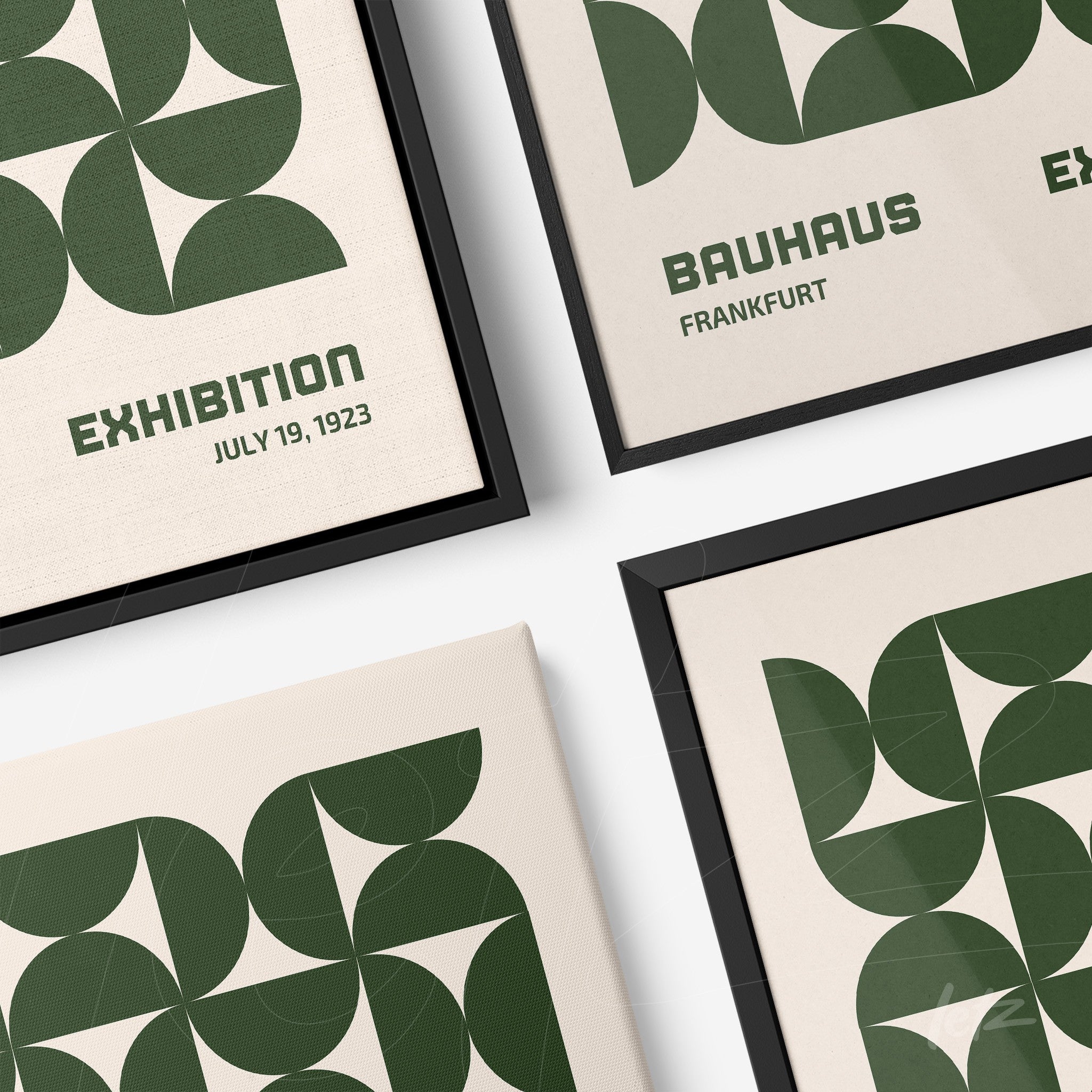 canvas wall art with green geometric pattern displayed in black frame