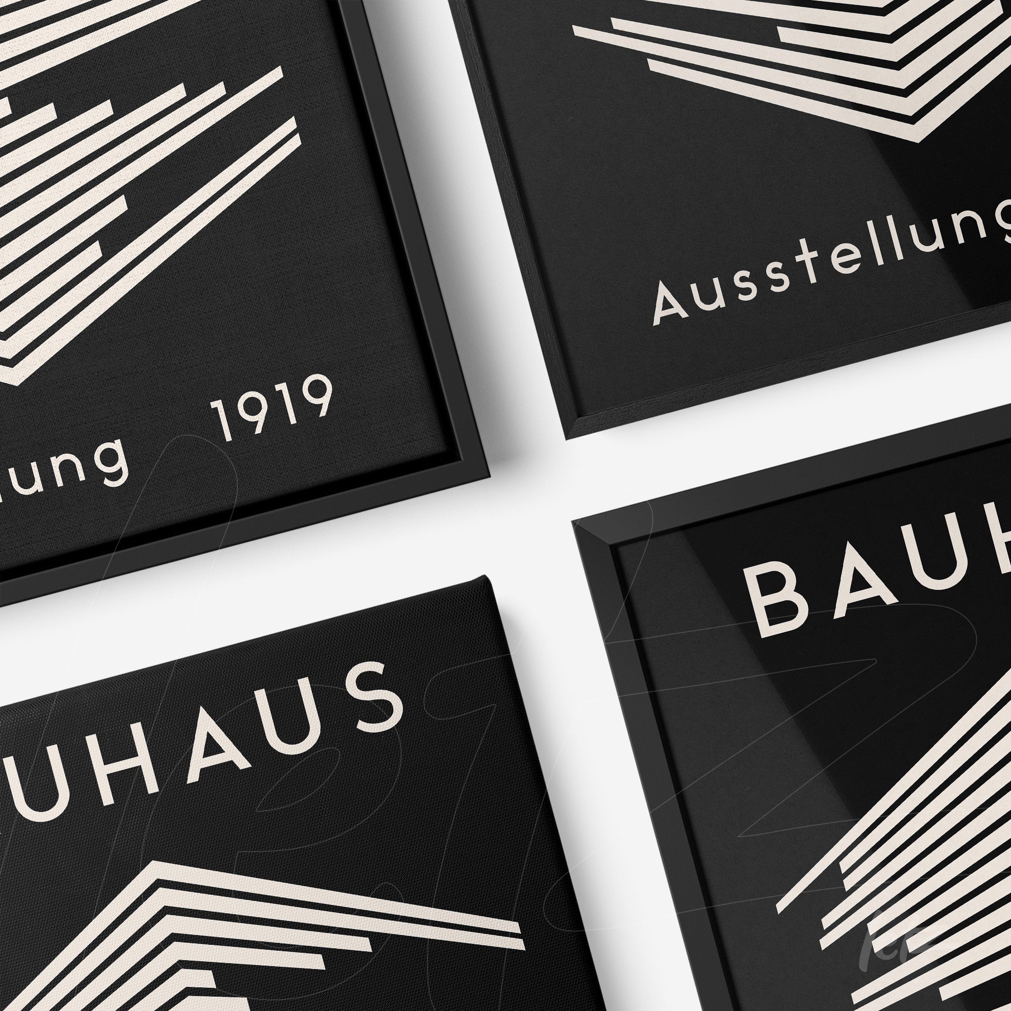 set of canvas art prints featuring geometric black and white bauhaus-style design with textual details and thin black frames