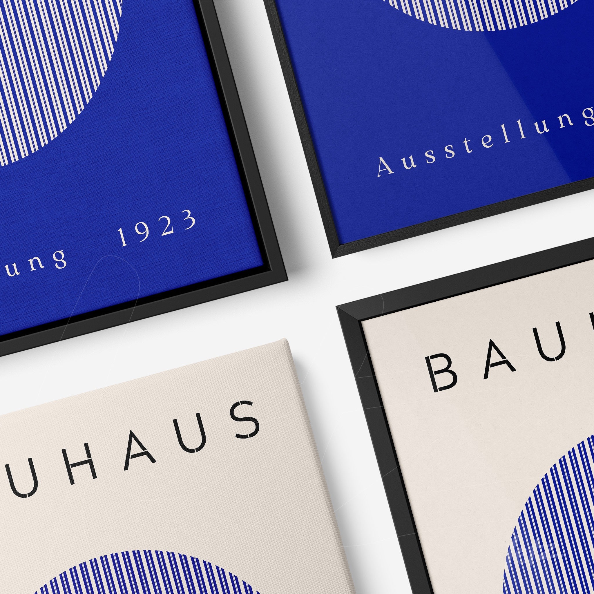 canvas print featuring modernist graphic design with text in blue and beige displayed in black frame