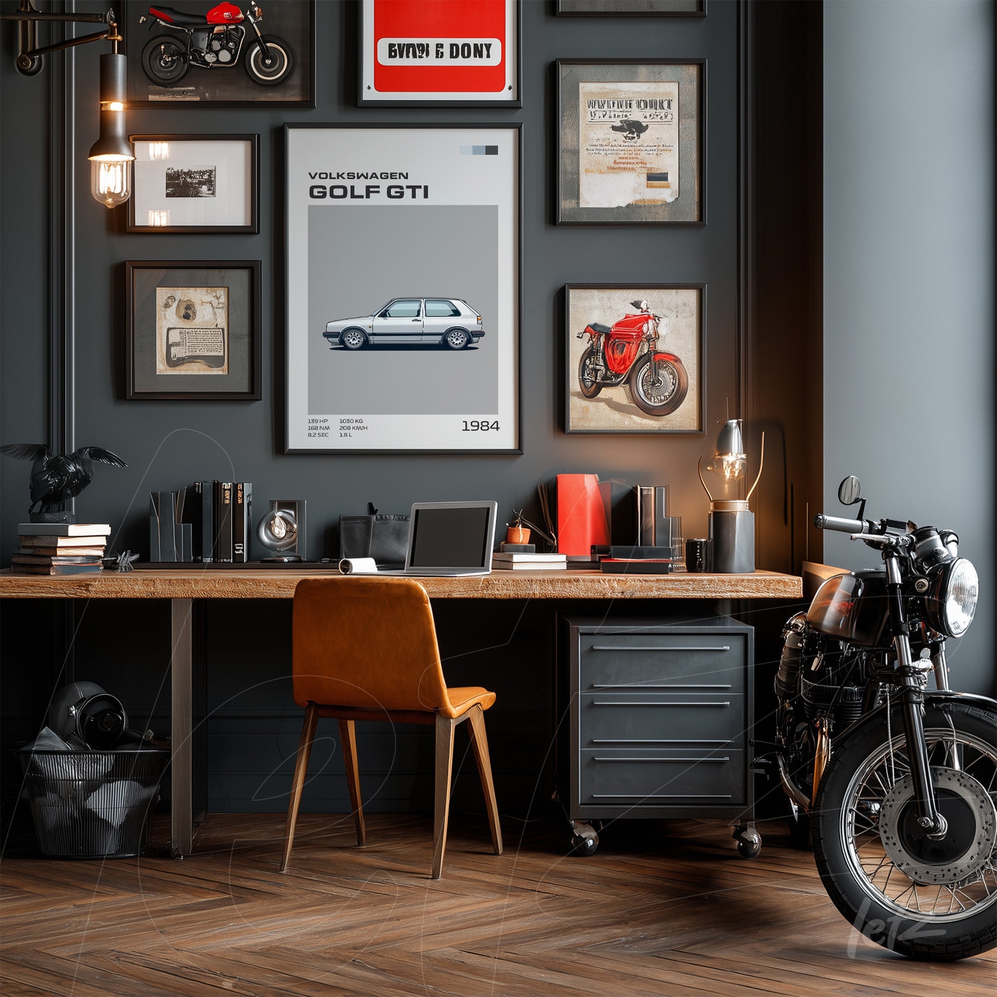 display of vintage wall art on dark blue wall with light wood desk and leather chair, featuring a poster of 1984 Volkswagen Golf GTI