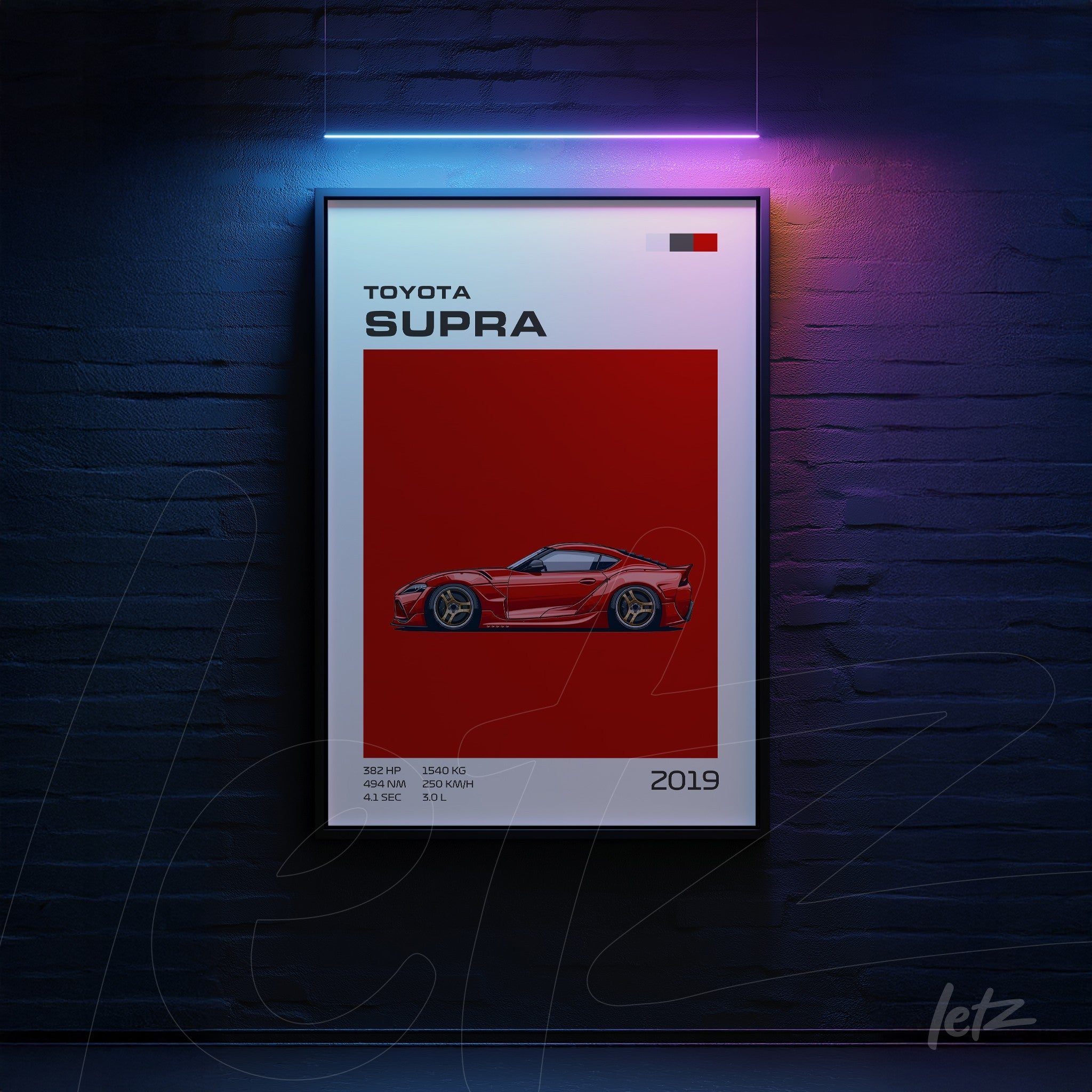 framed wall art featuring a red Toyota Supra illustration with graphic details and a black frame