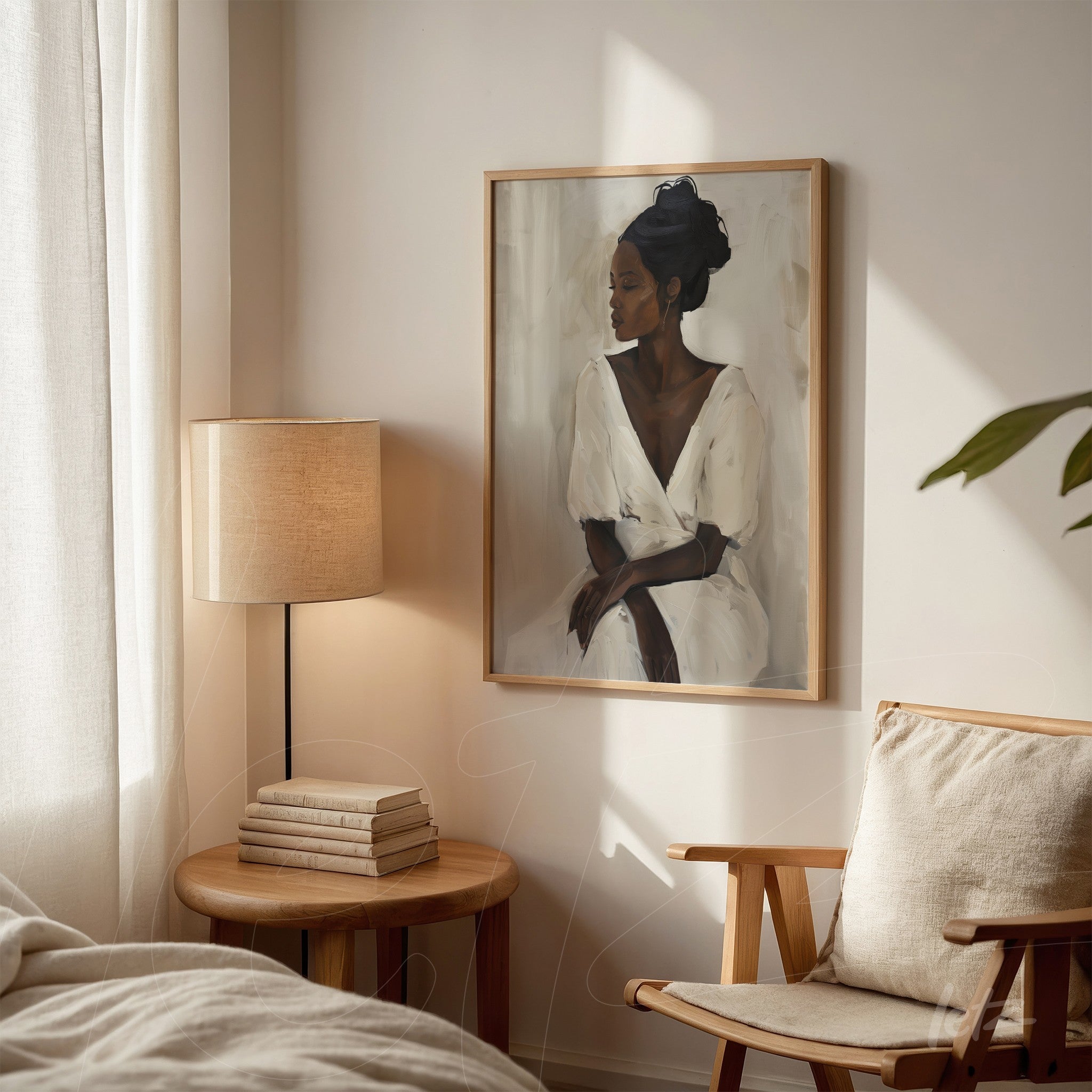 framed portrait of a black woman in a white dress on a light wall beside a wooden side table and lamp