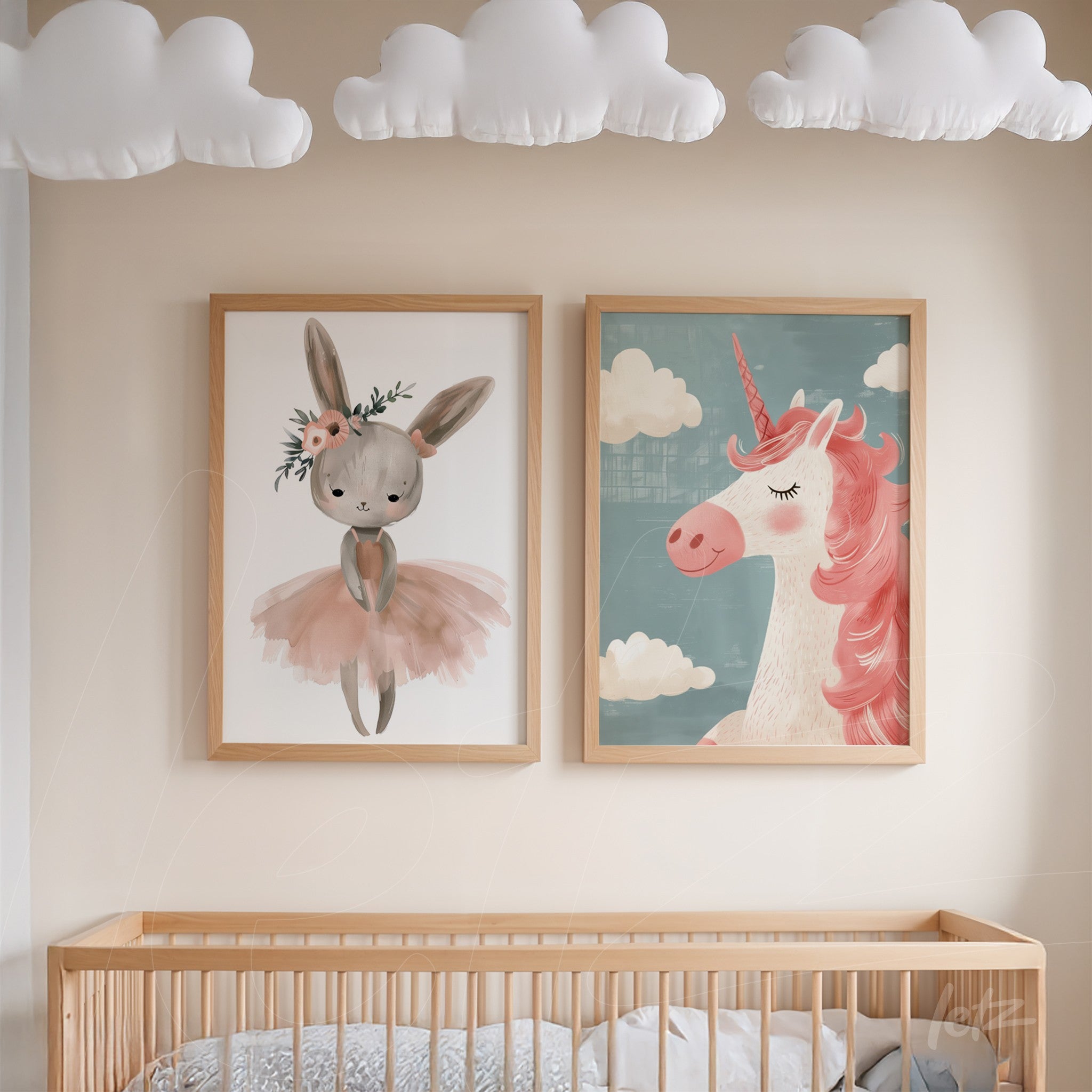 set of playful wall art featuring a dancing bunny and a unicorn in light wooden frames on a nursery wall