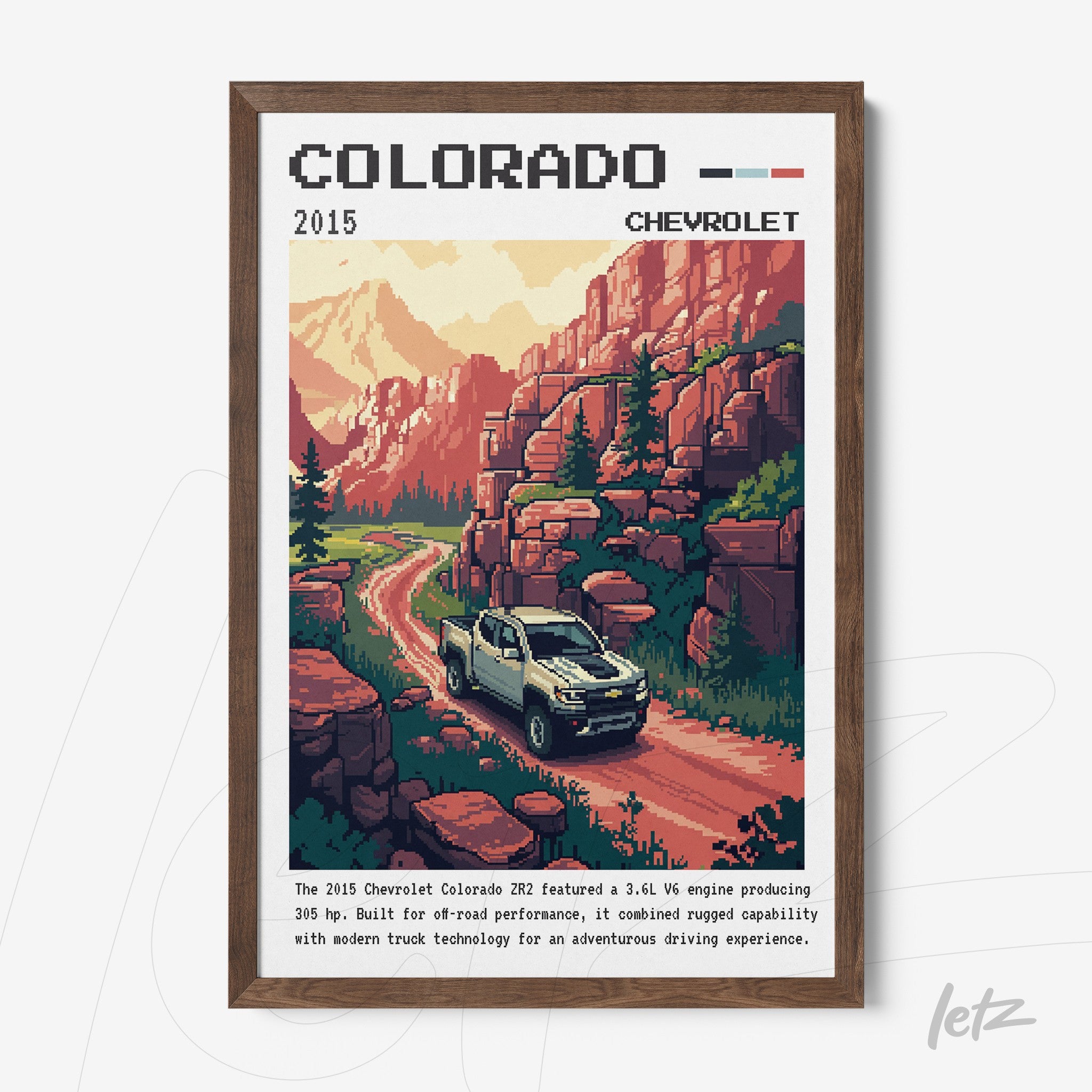 vintage style framed art of Chevrolet Colorado truck in mountainous landscape with dark wood frame