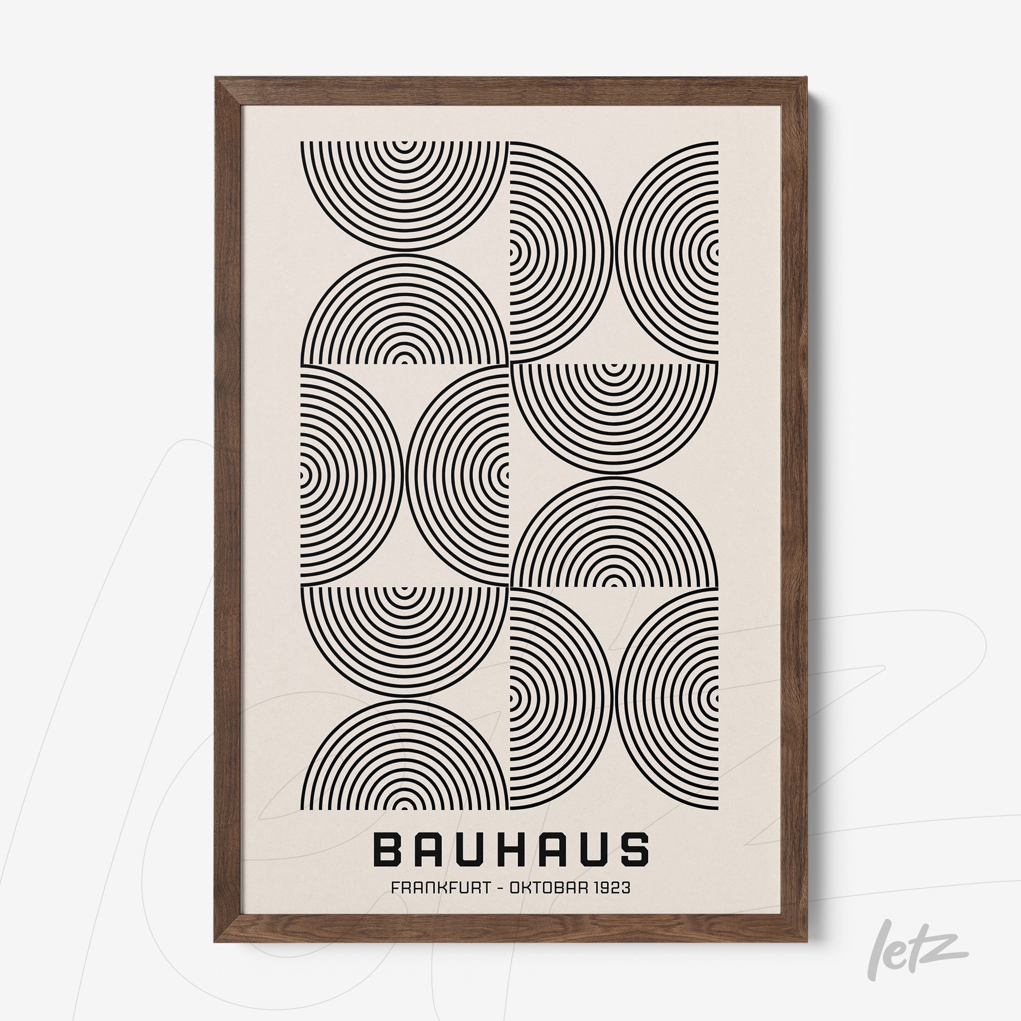 canvas with bauhaus style geometric art in dark wood frame