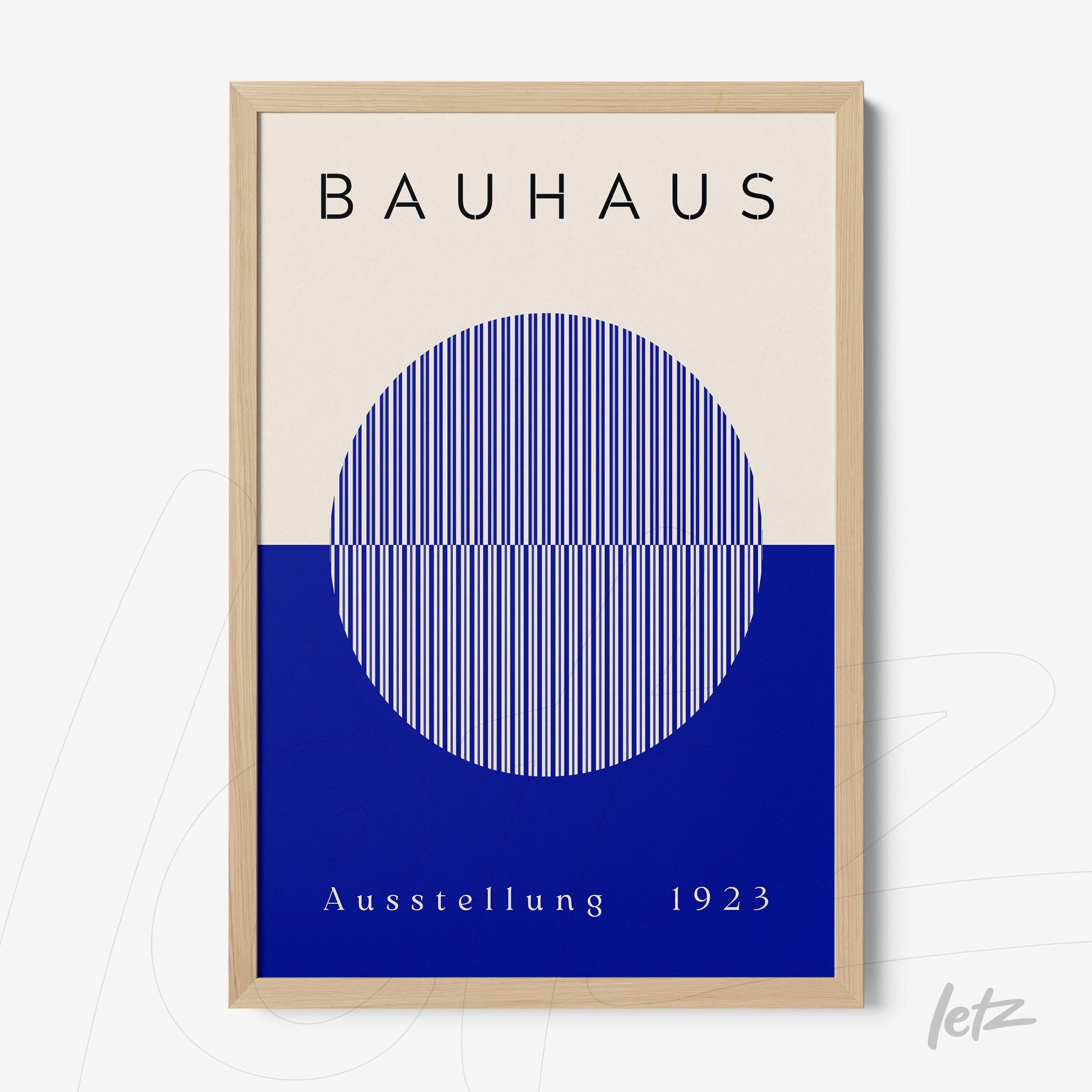 poster print featuring geometric Bauhaus design in cream and blue background with light wood frame