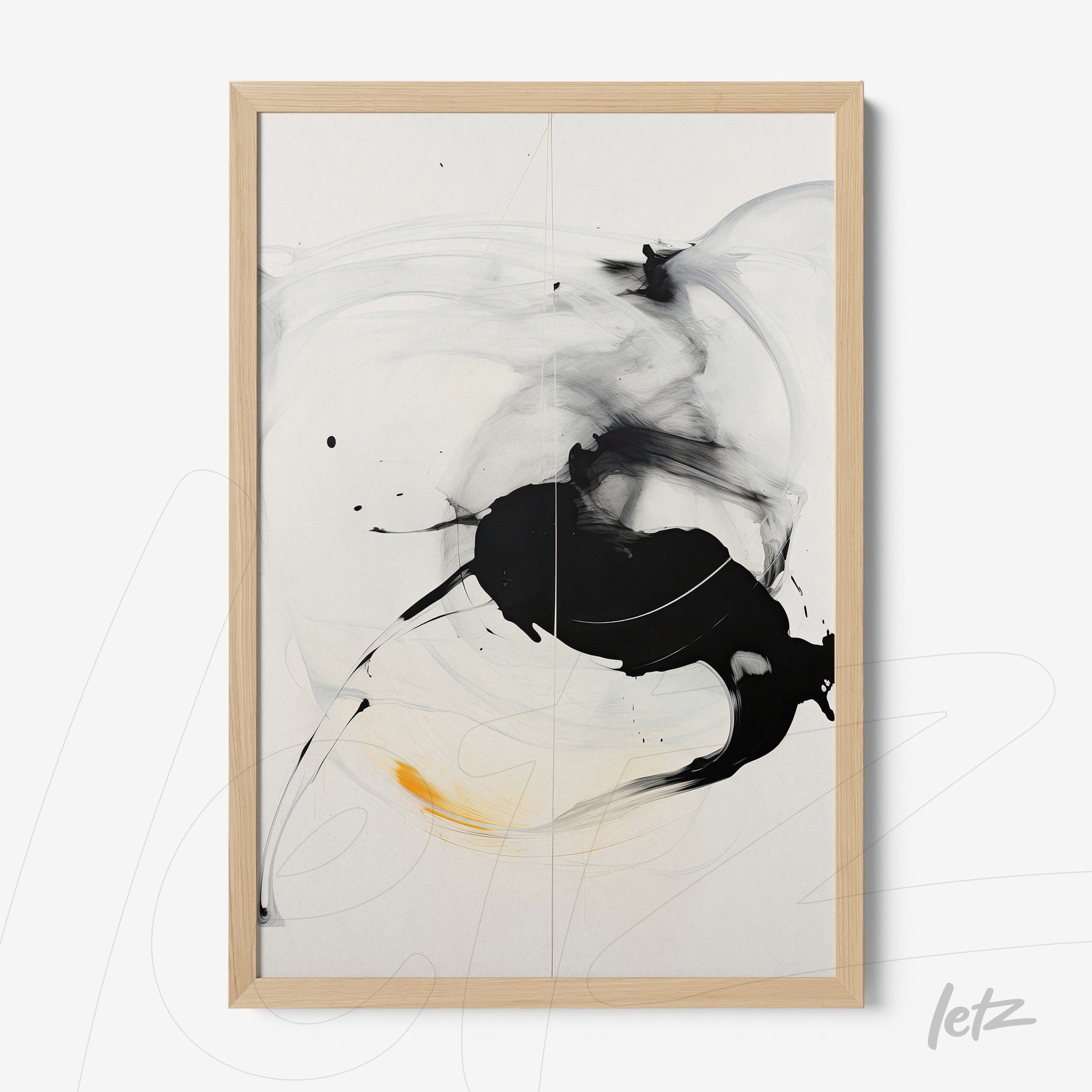 framed abstract art piece in black and white with orange accents in light wood frame