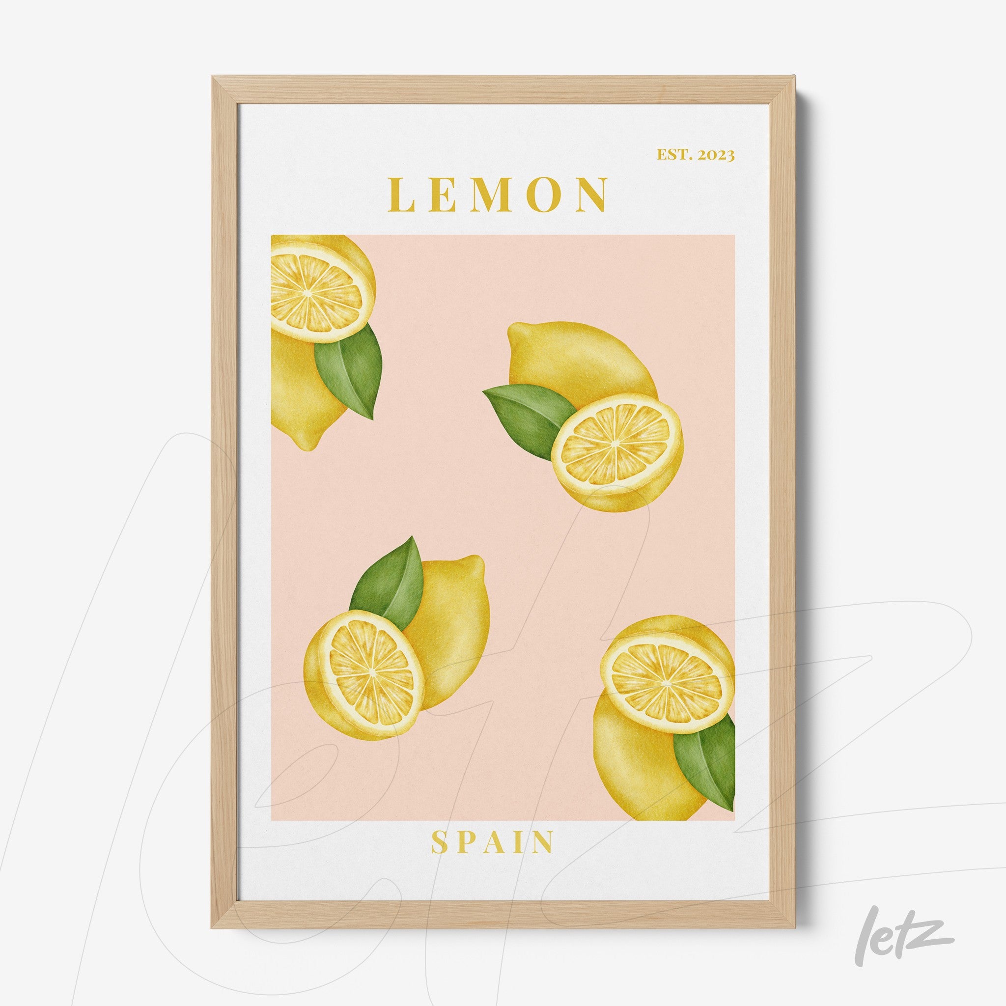 framed artwork featuring illustrated lemons with a light wood frame and pink background