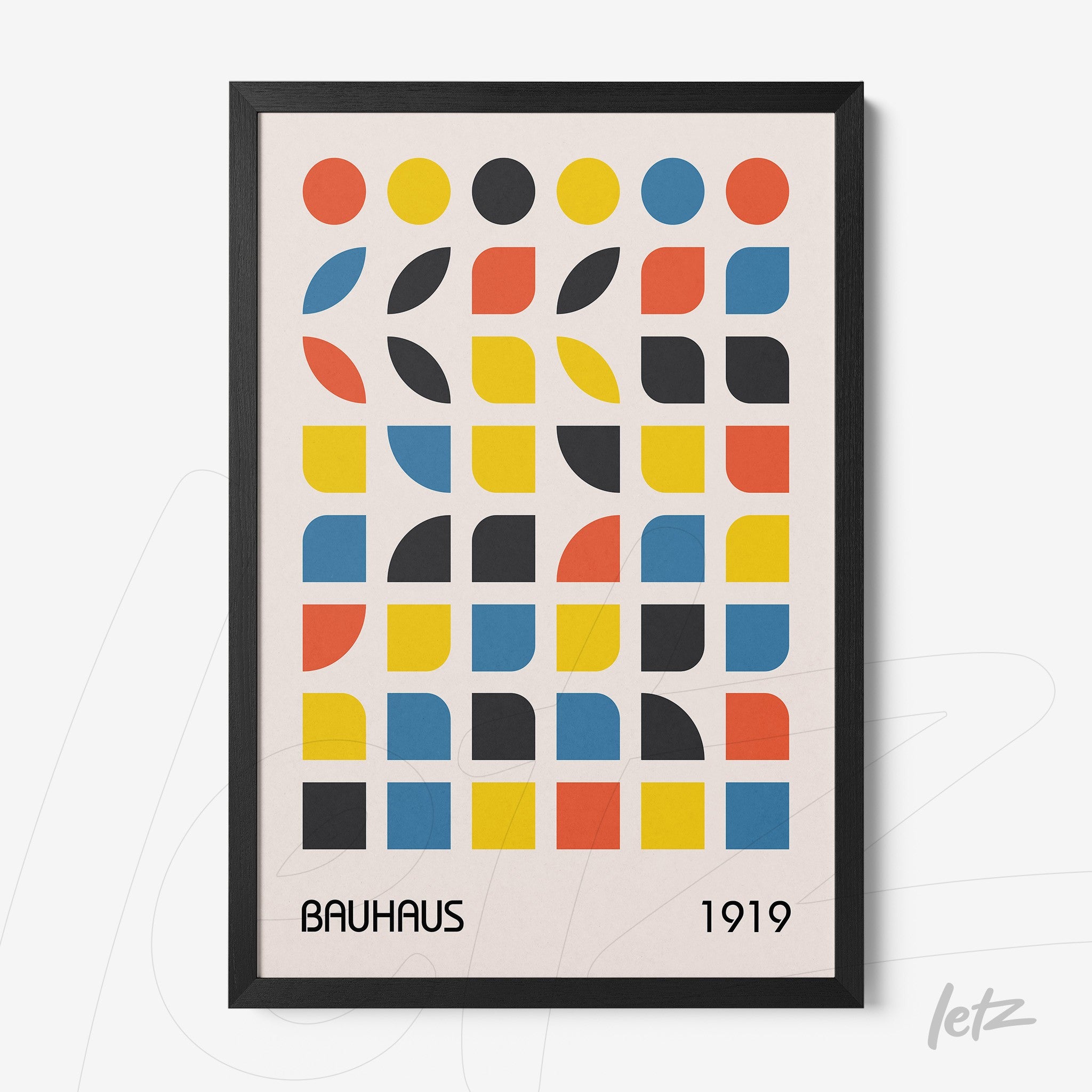 framed geometric design art in Bauhaus style with black frame