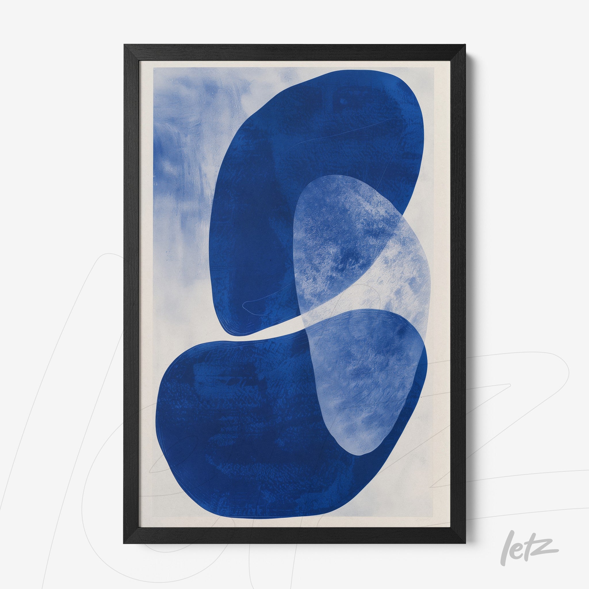 framed abstract wall art featuring organic shapes in shades of blue