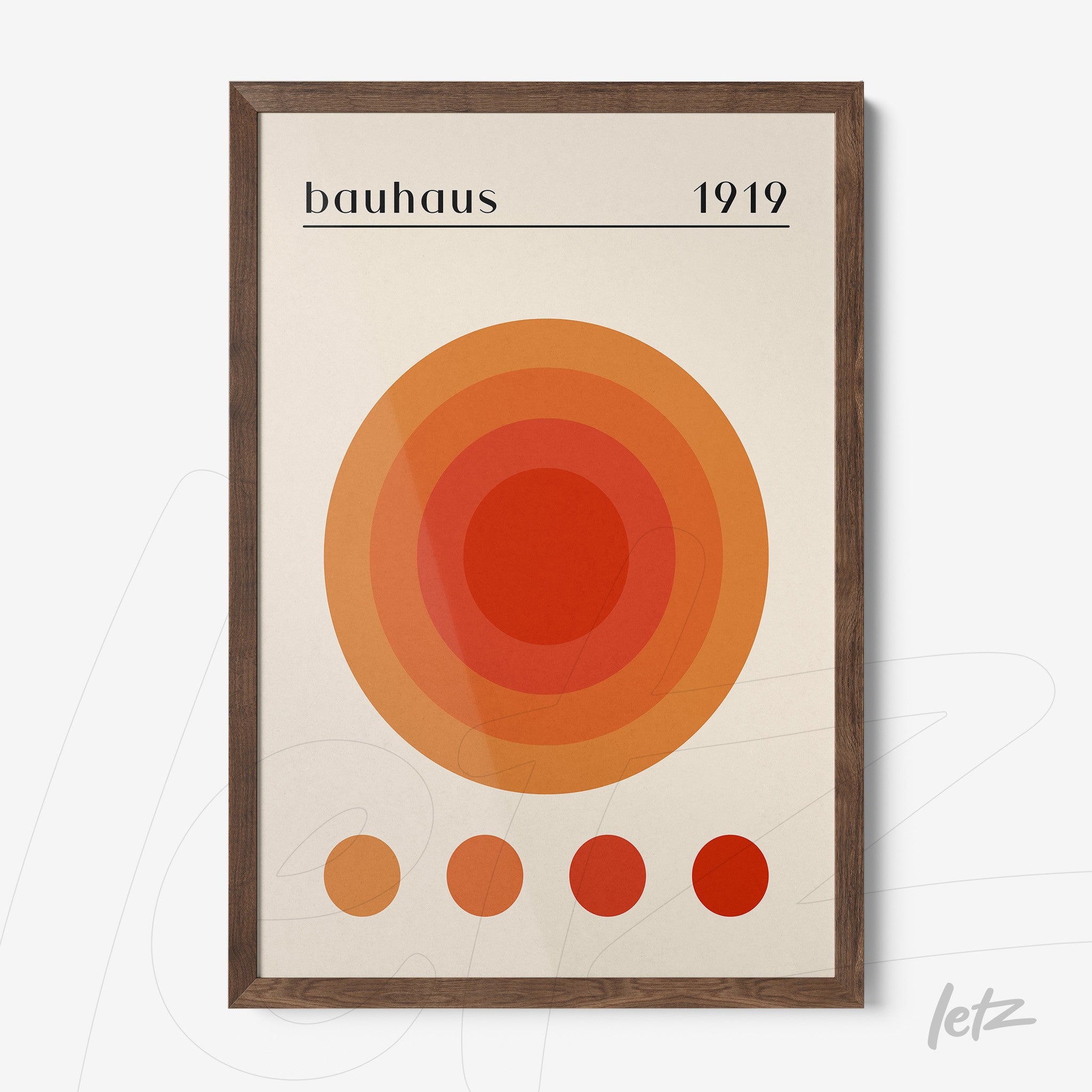 modern bauhaus style art print with concentric orange and red circles on a light background, dark wood frame