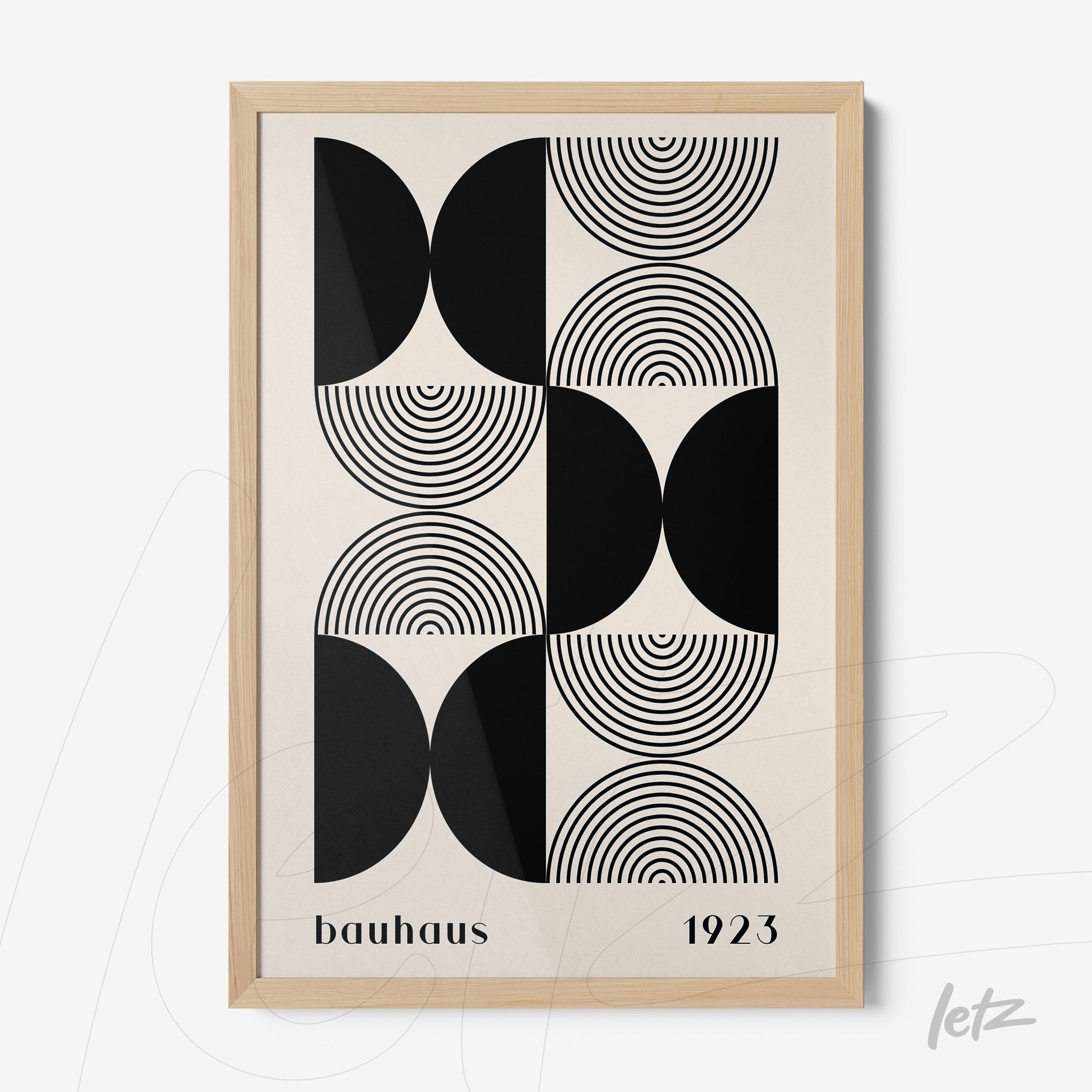poster print featuring bauhaus style geometric art with light wood frame