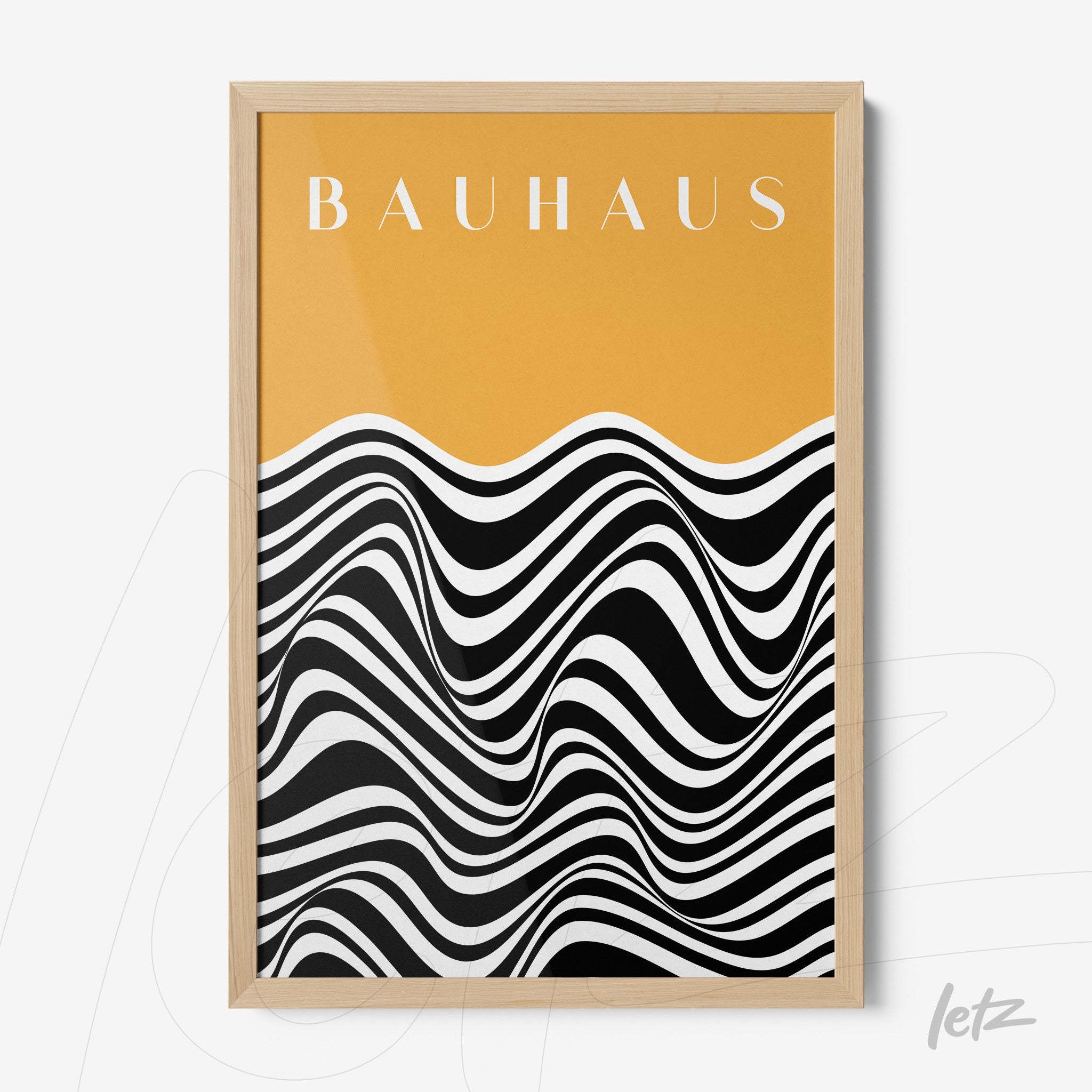 framed abstract art with wavy black and white lines on an orange background, displayed in a light wood frame