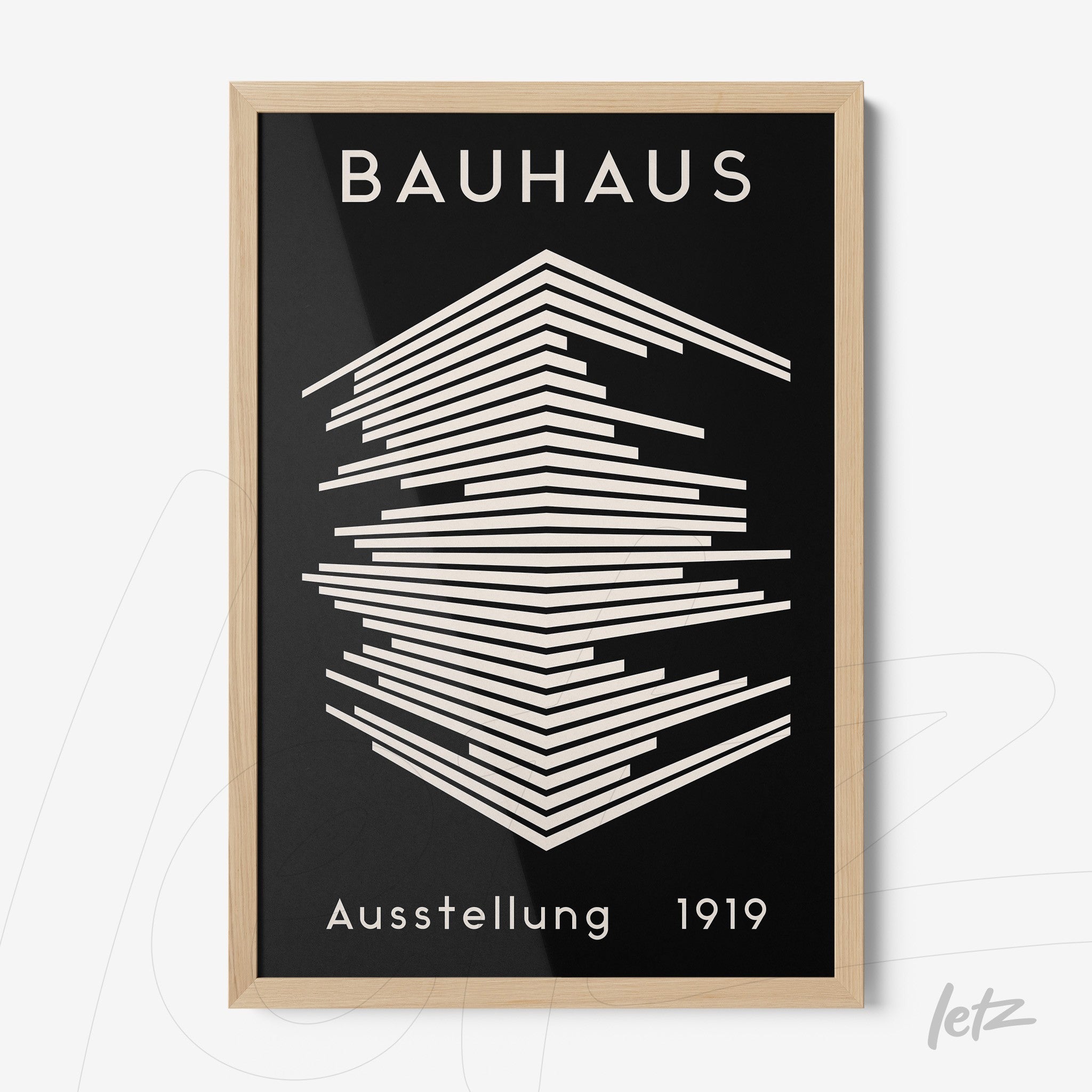 poster of Bauhaus movement with geometric design in light wood frame