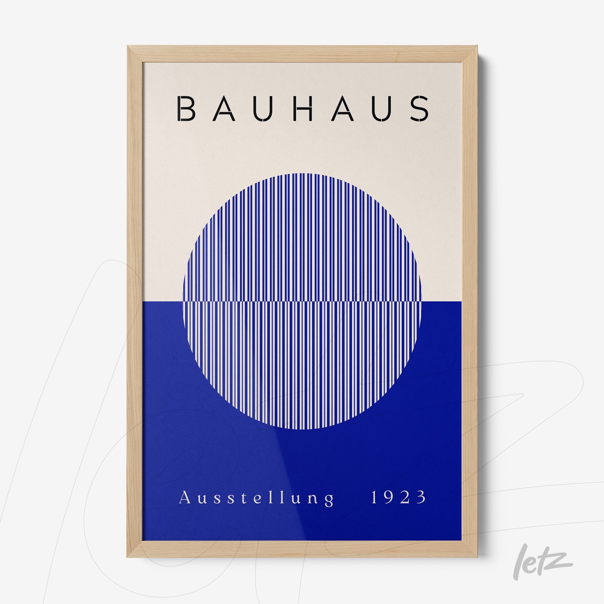 minimalist Bauhaus-style poster art in a light wooden frame