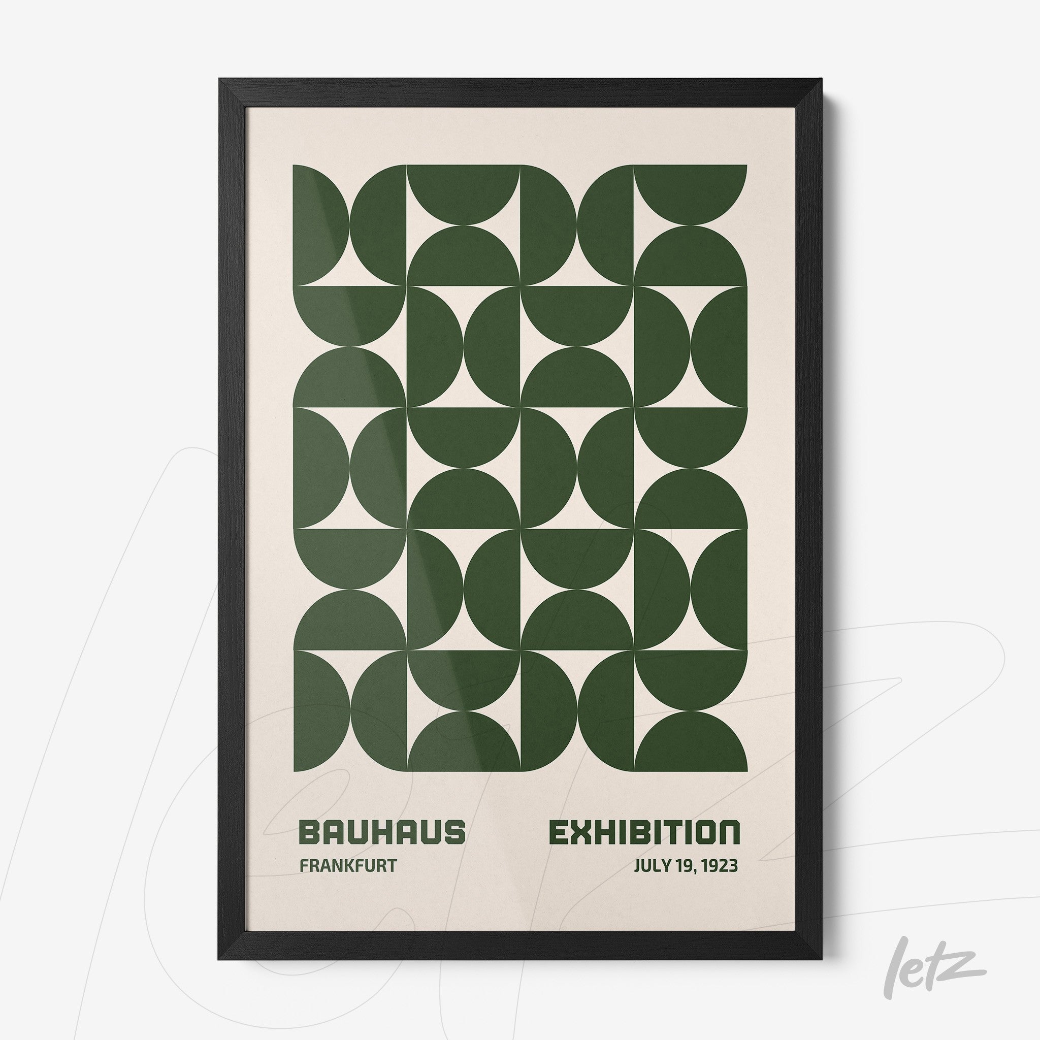 poster print with green geometric Bauhaus style design displayed in black frame