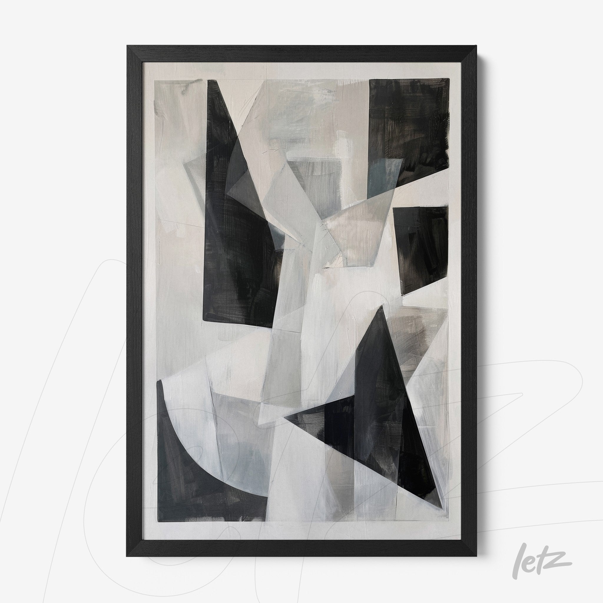 abstract wall art in shades of black and gray with black frame