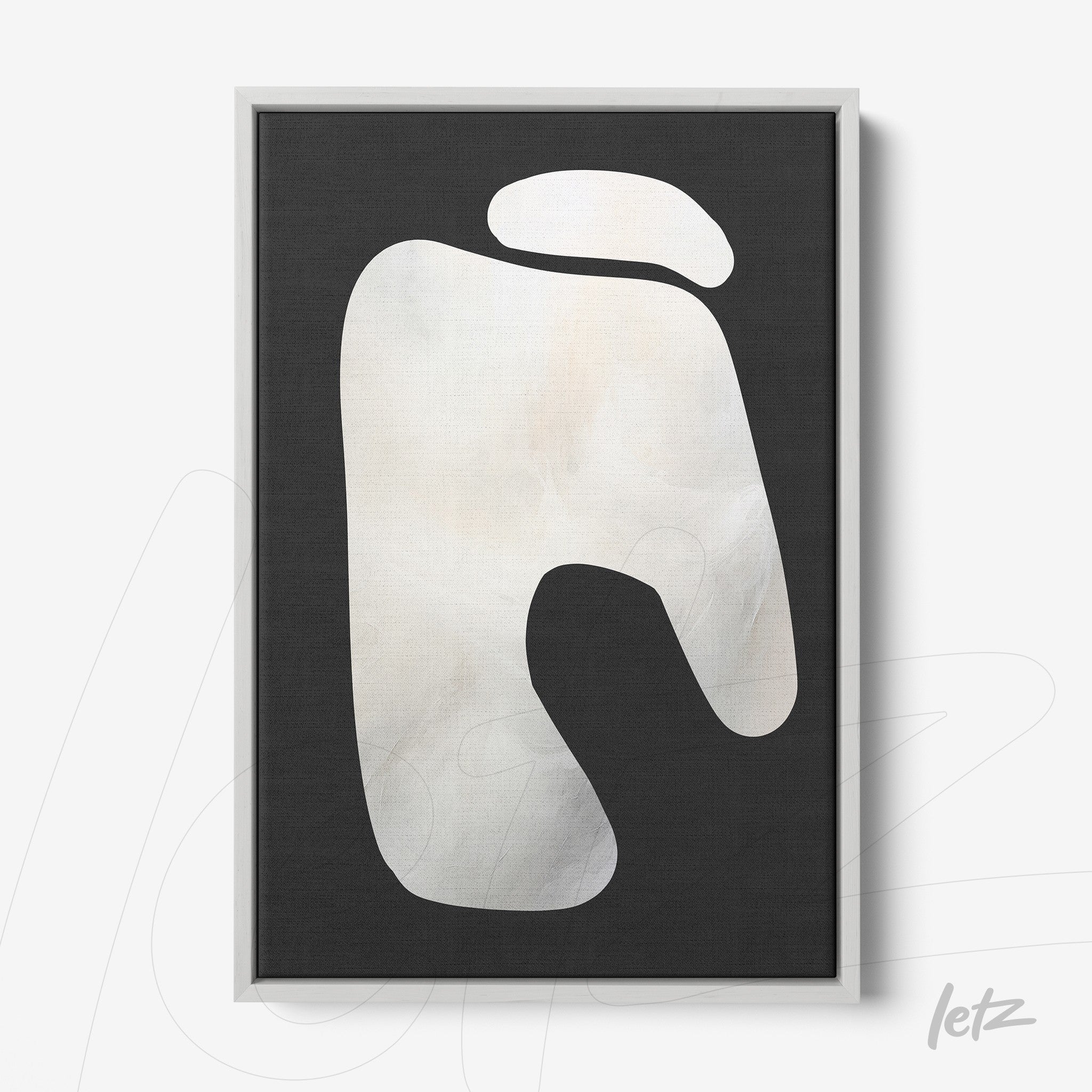 framed abstract art in black background featuring light organic shapes with white frame
