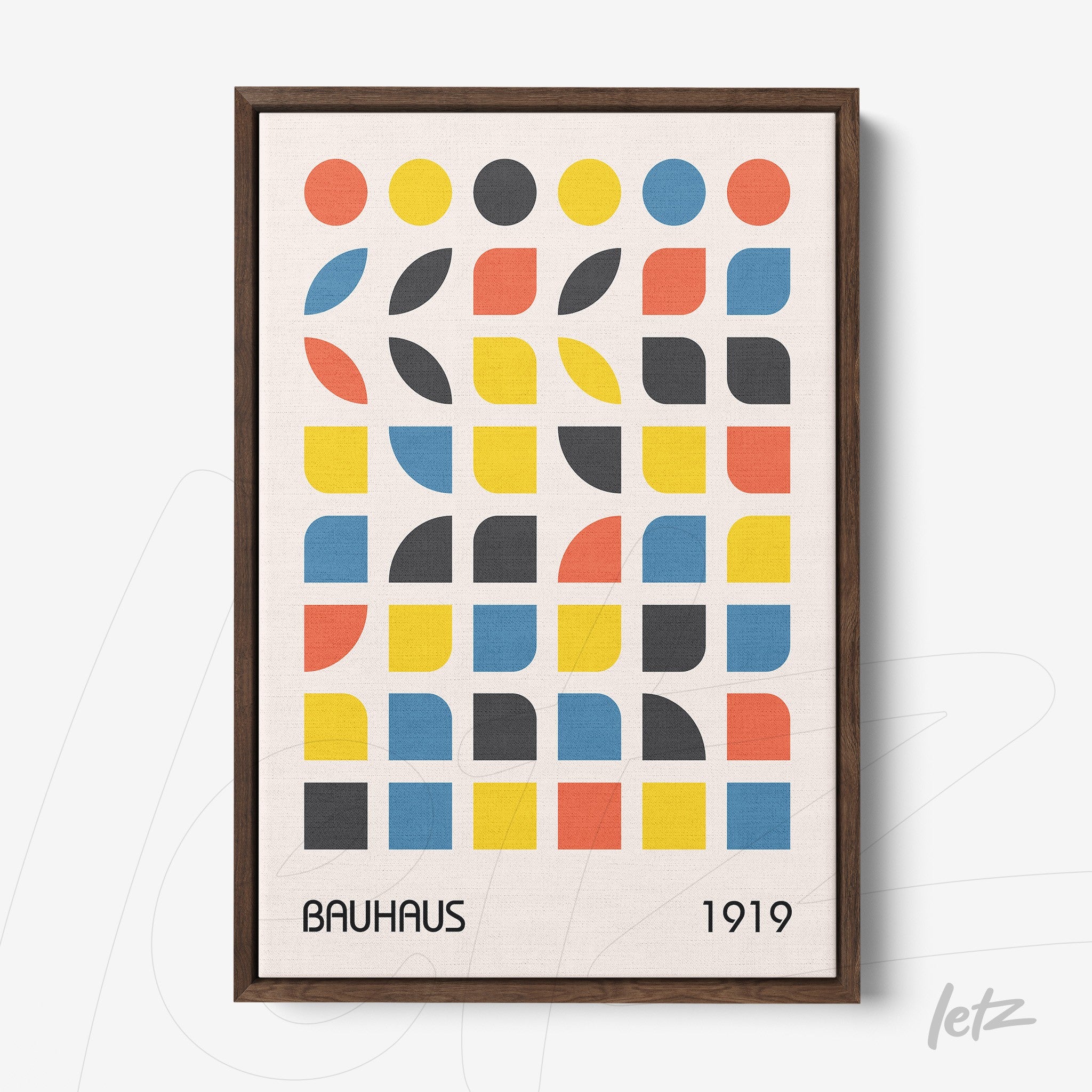 framed geometric Bauhaus style art with colorful squares and circles in a dark frame