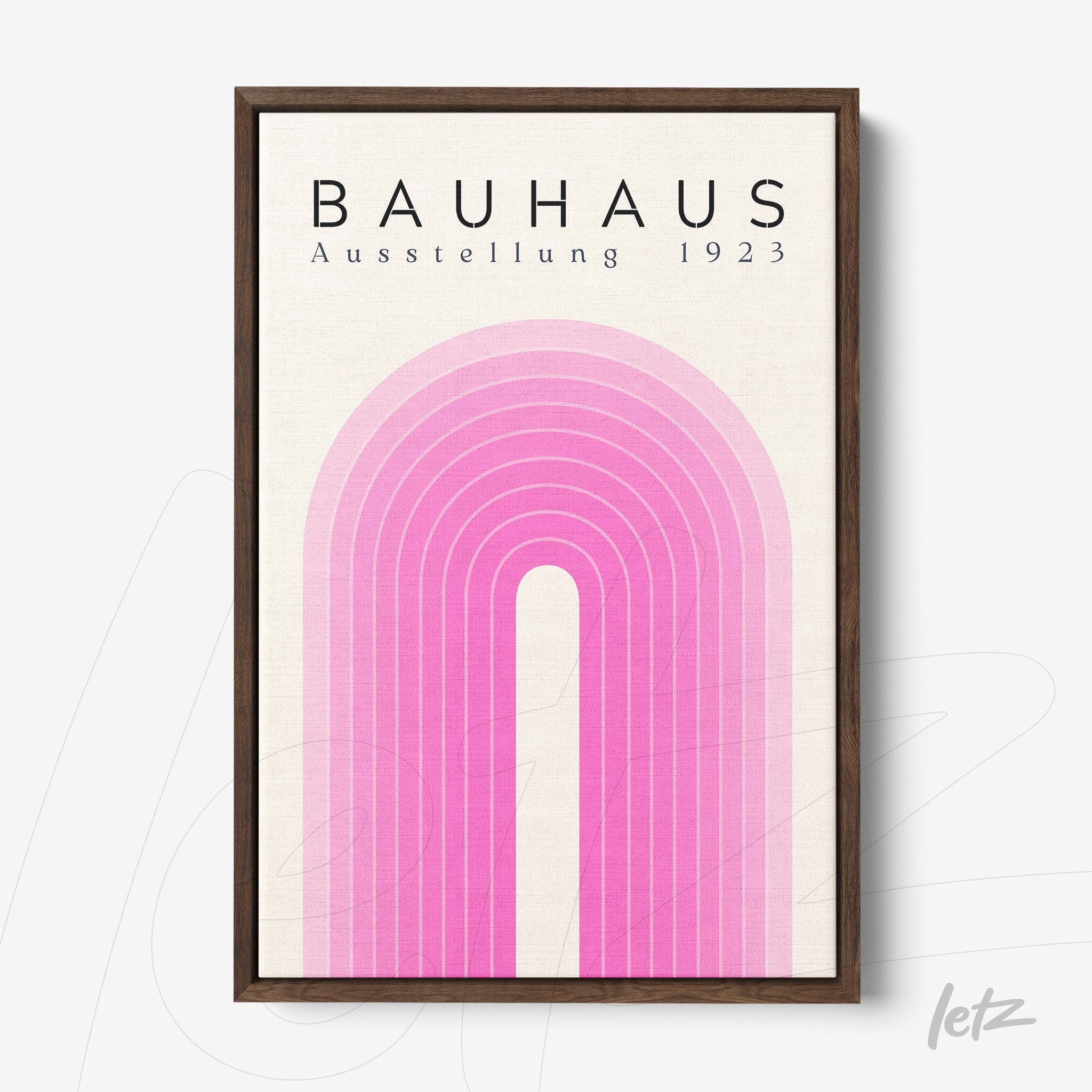 poster print featuring geometric design in shades of pink with dark wood frame