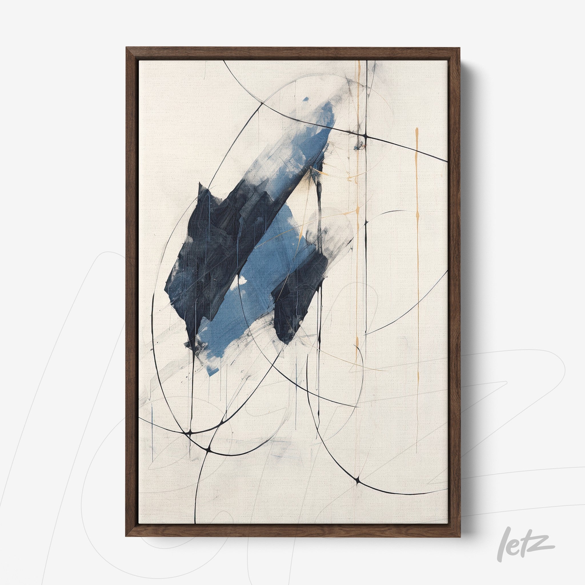 framed abstract art in shades of blue and black with dark wood frame