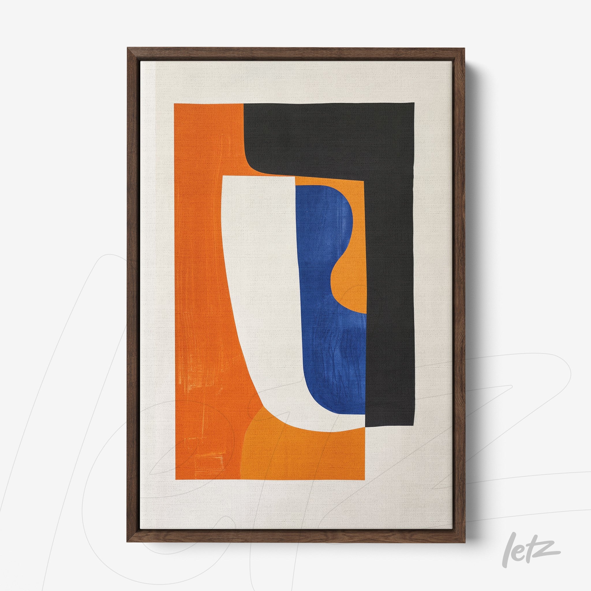 framed abstract art piece in orange, blue, and black tones with dark wood frame
