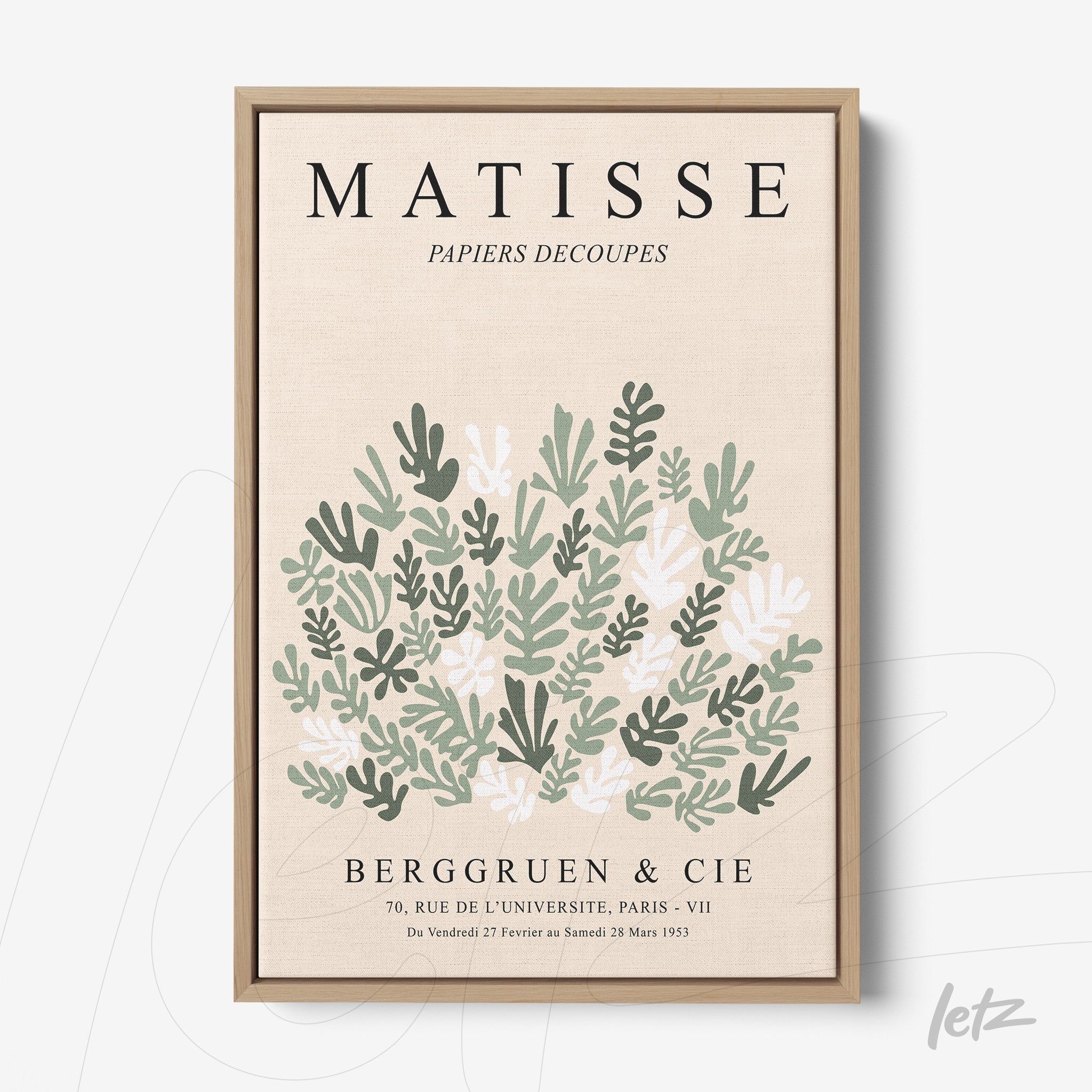 framed art print featuring stylized plants in shades of green and white with light wood frame