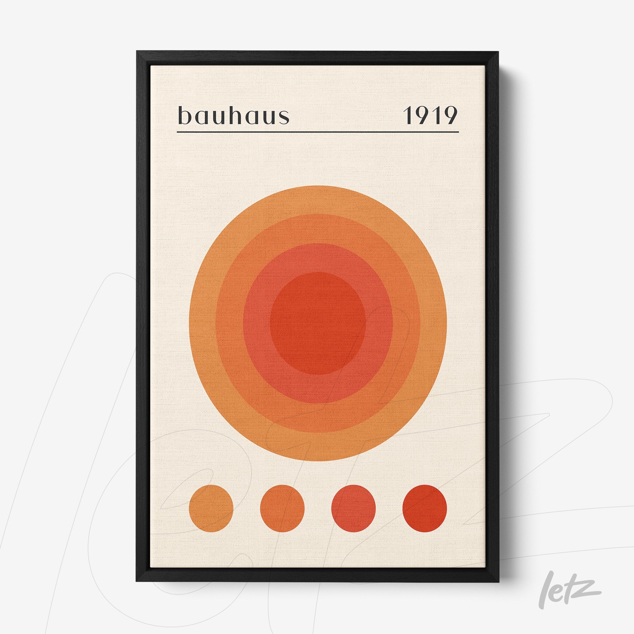 minimalist print featuring concentric circles in warm tones with decorative text 'bauhaus 1919' displayed in black frame on light background