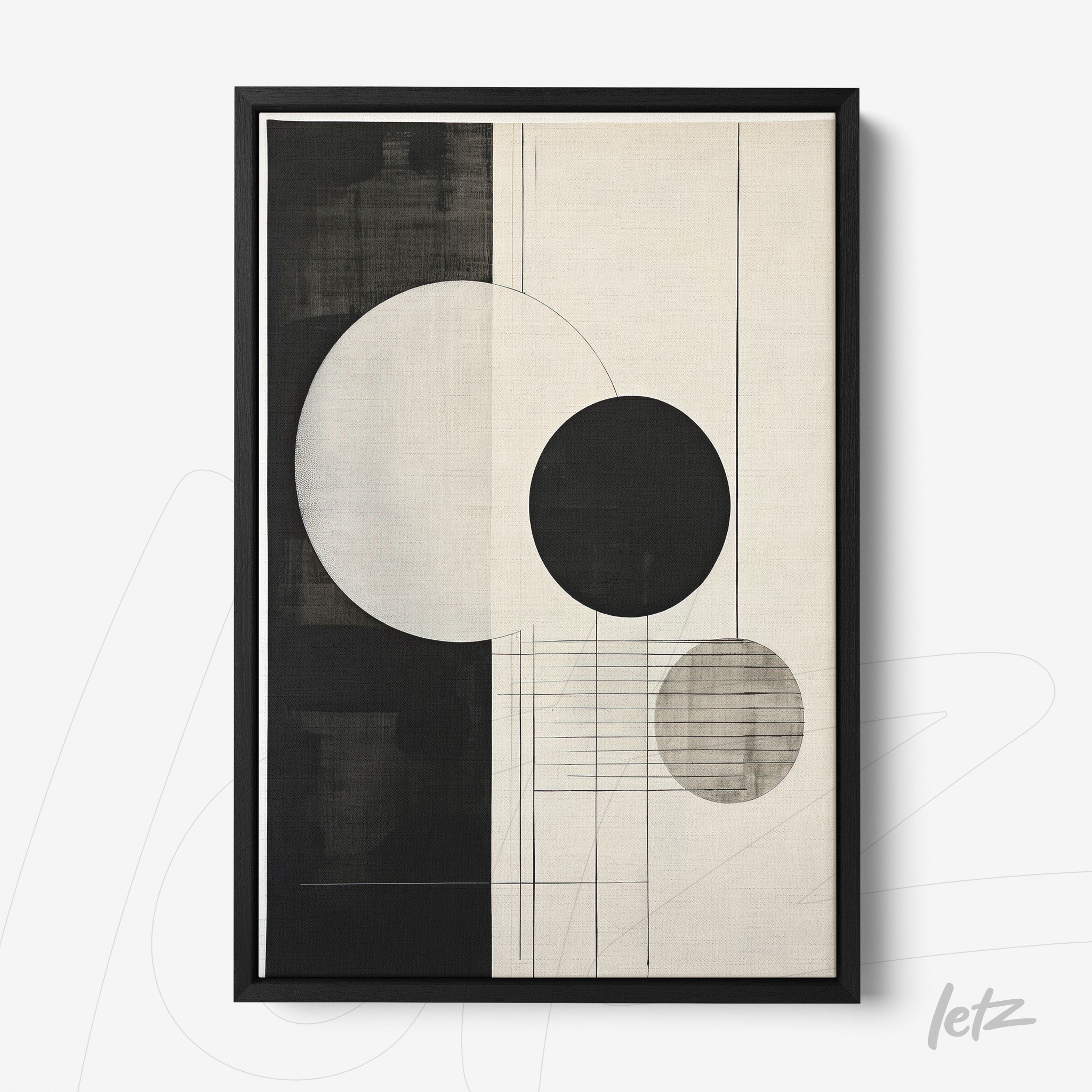 framed abstract wall art in black and white featuring circular geometric shapes