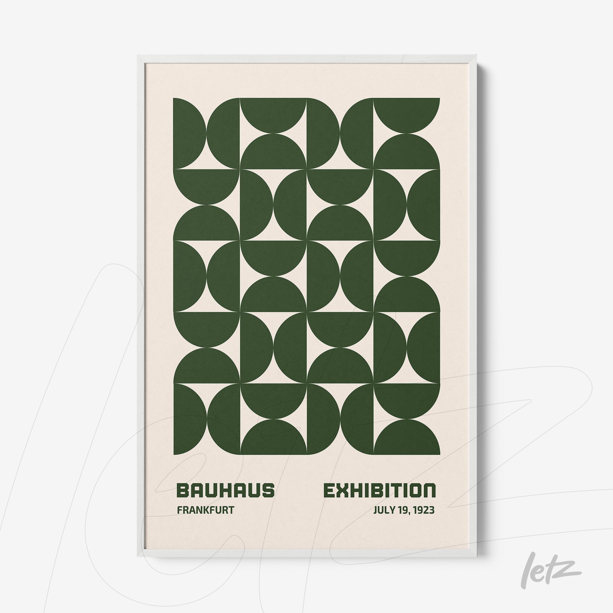 poster print featuring green geometric design and text about 1923 Bauhaus exhibition in white frame