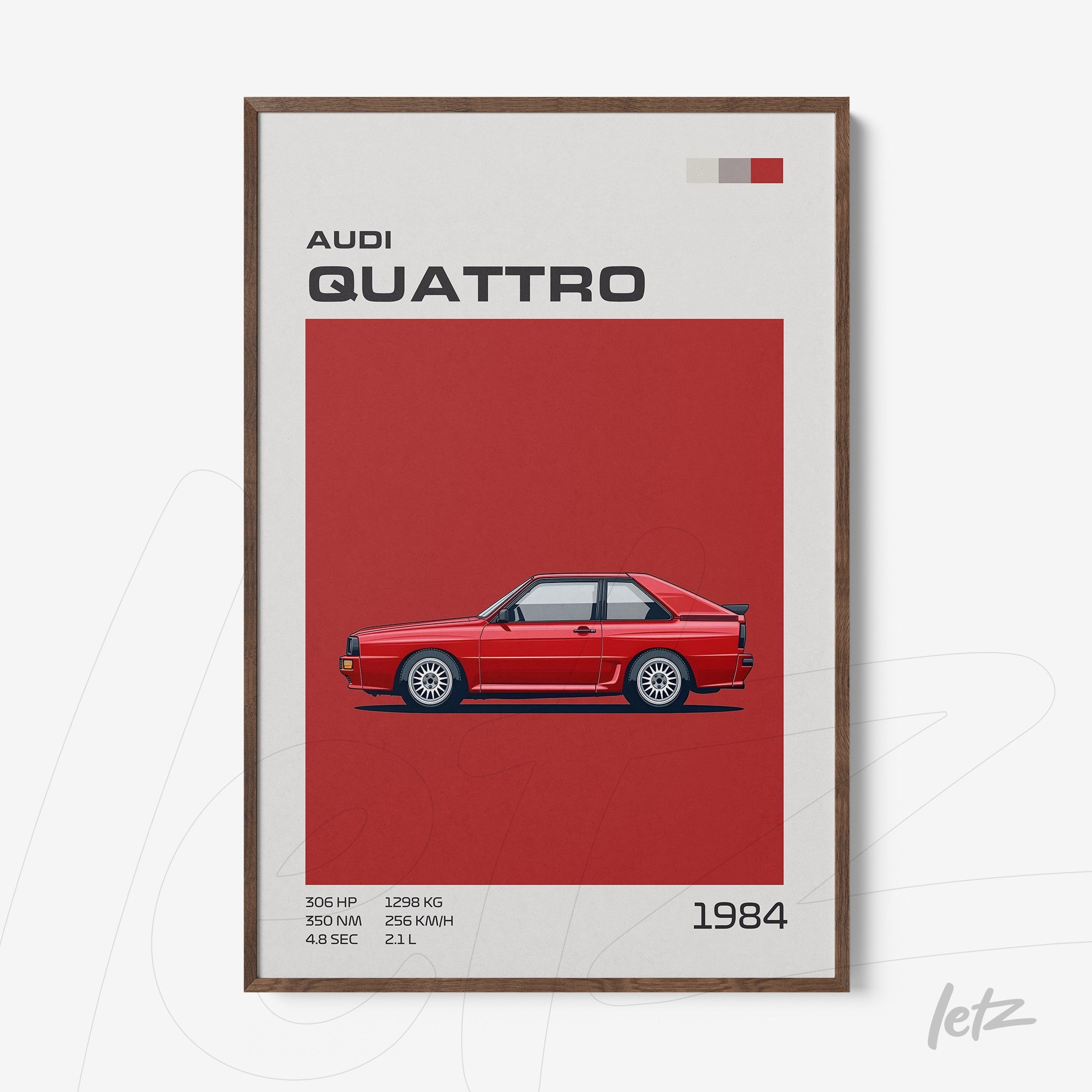 framed artwork featuring the Audi Quattro car illustration with a red background and dark wooden frame