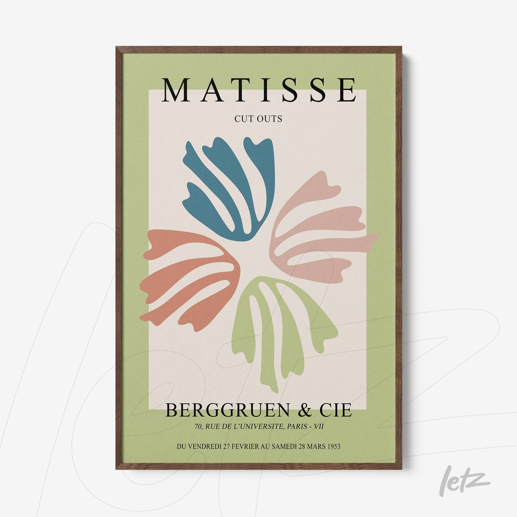 framed artwork featuring abstract colorful leaves in dark wood frame