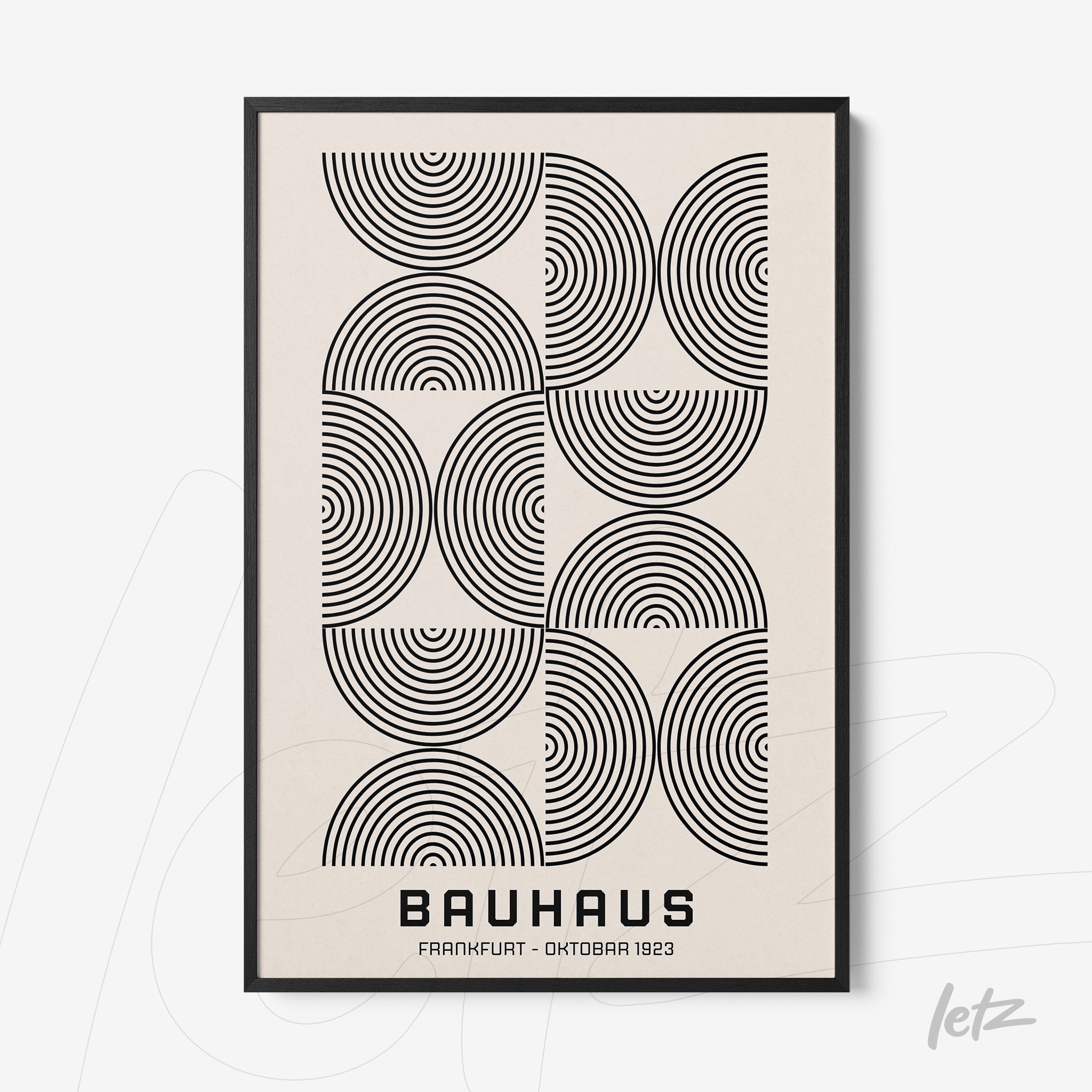 poster print with geometric pattern of concentric circles in a thin black frame
