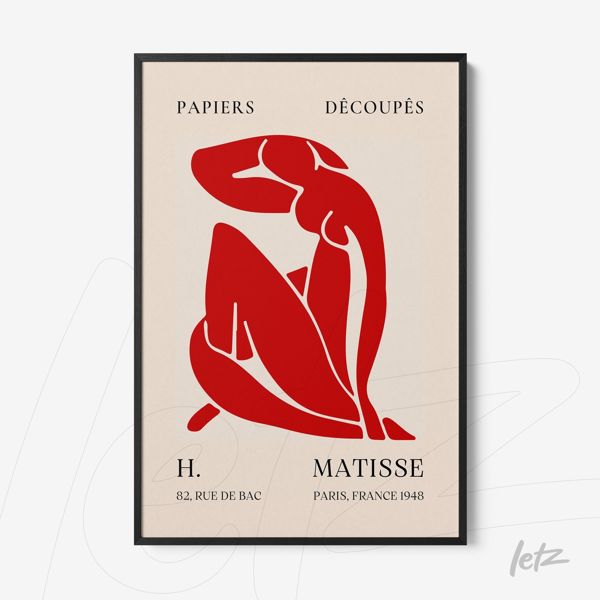 framed artwork featuring a red silhouette of a female figure in a modern style on a cream background