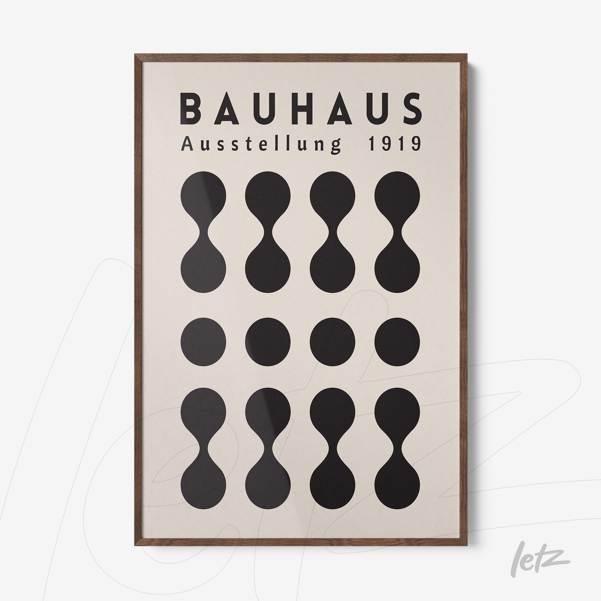 poster print of abstract bauhaus design from 1919 with wooden frame, featuring organic shapes and german text on a light background