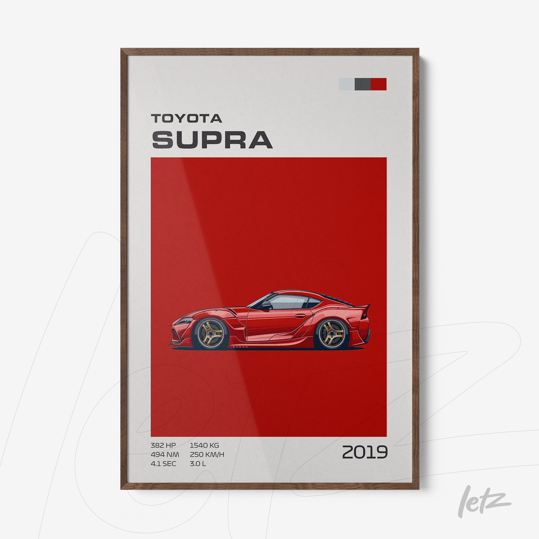 framed artwork of the 2019 Toyota Supra sports car on a vibrant red background with dark wooden frame