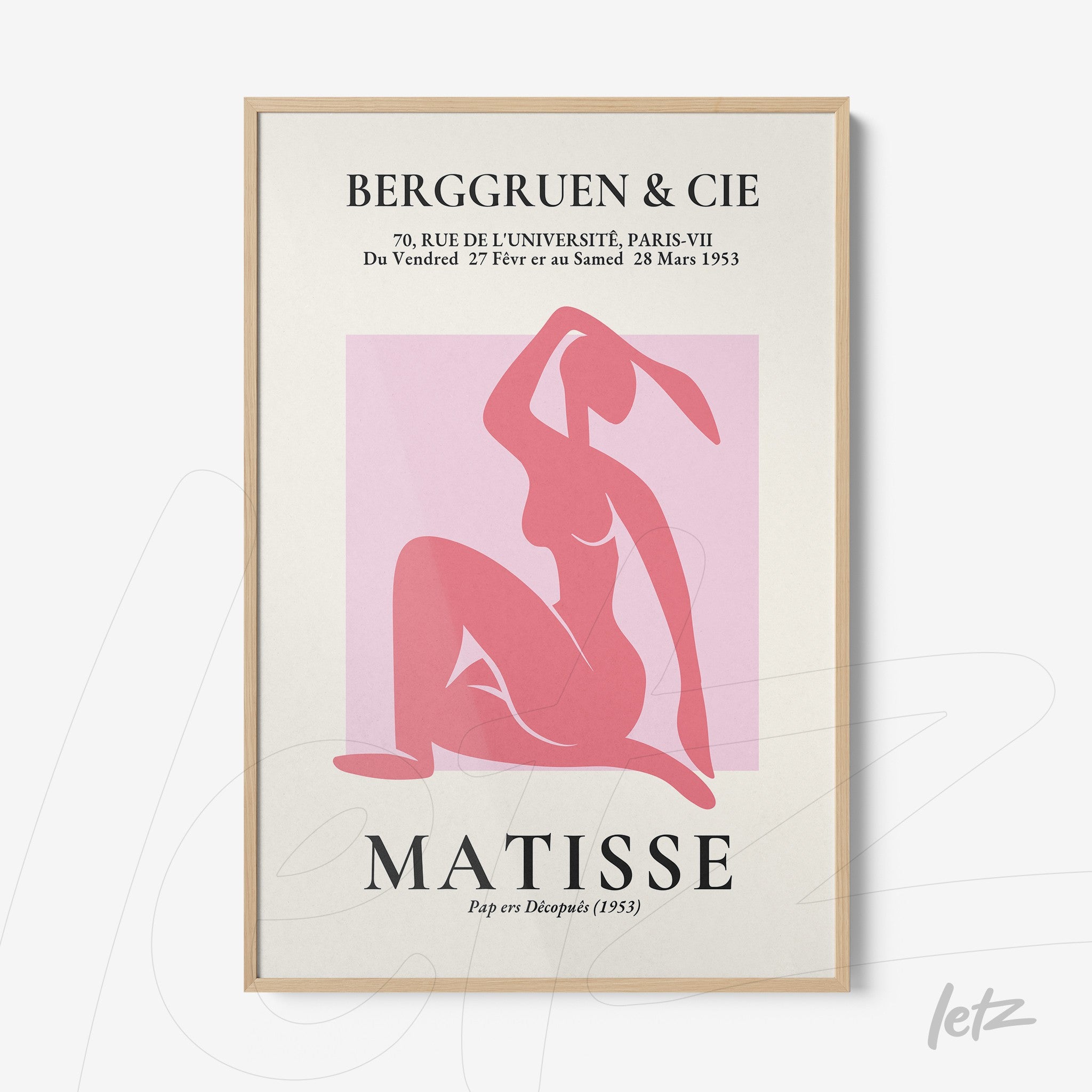 framed modern art piece featuring a female figure in pink tones on light background with light wood frame
