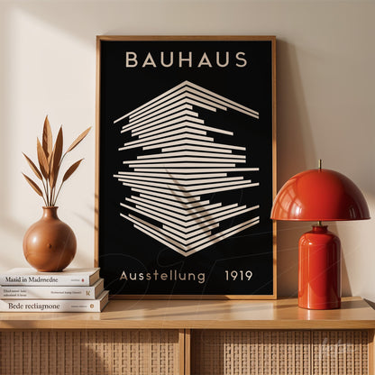 bauhaus style geometric design art on black background with wooden frame displayed on a console
