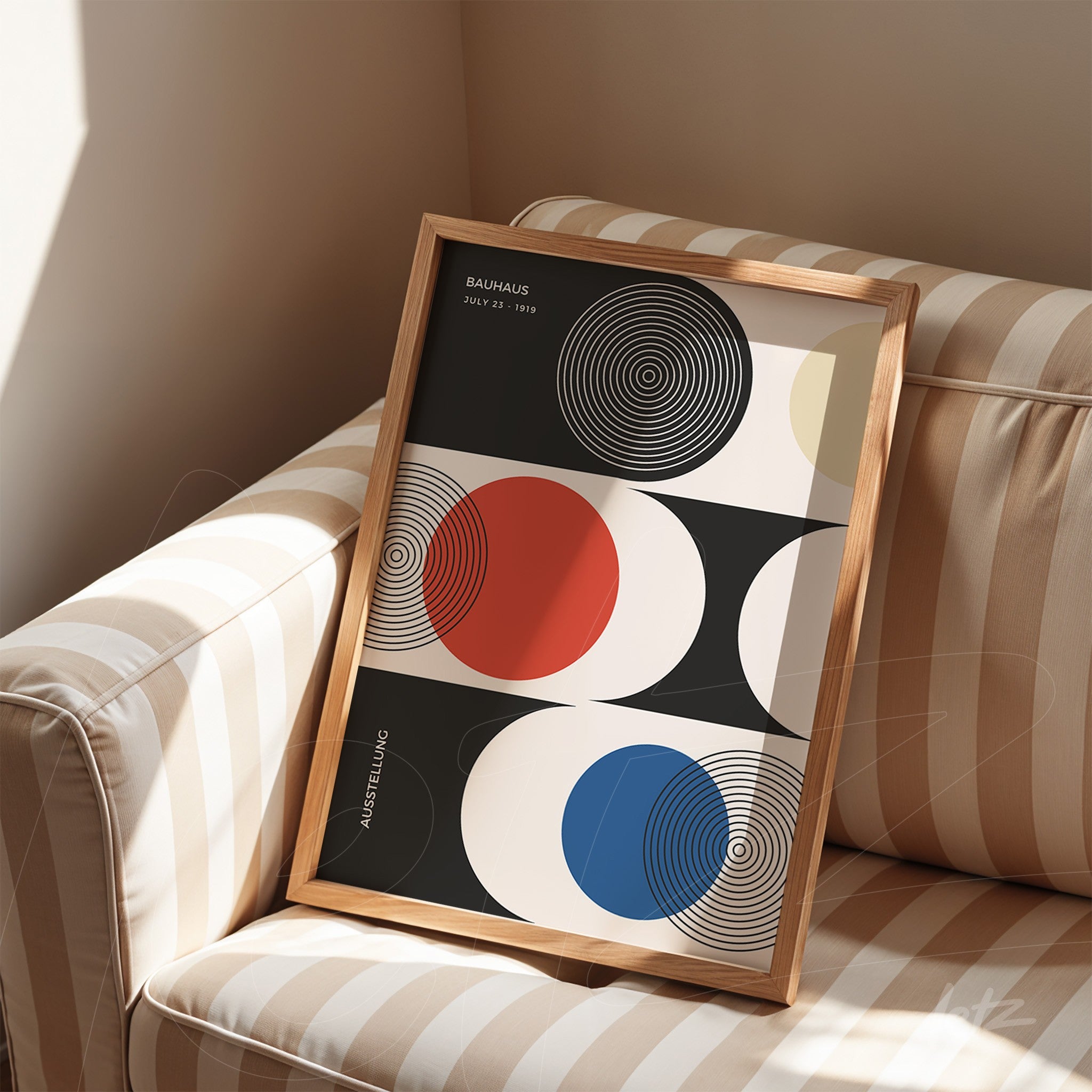 modernist framed art of colorful circles on a striped sofa with wooden frame