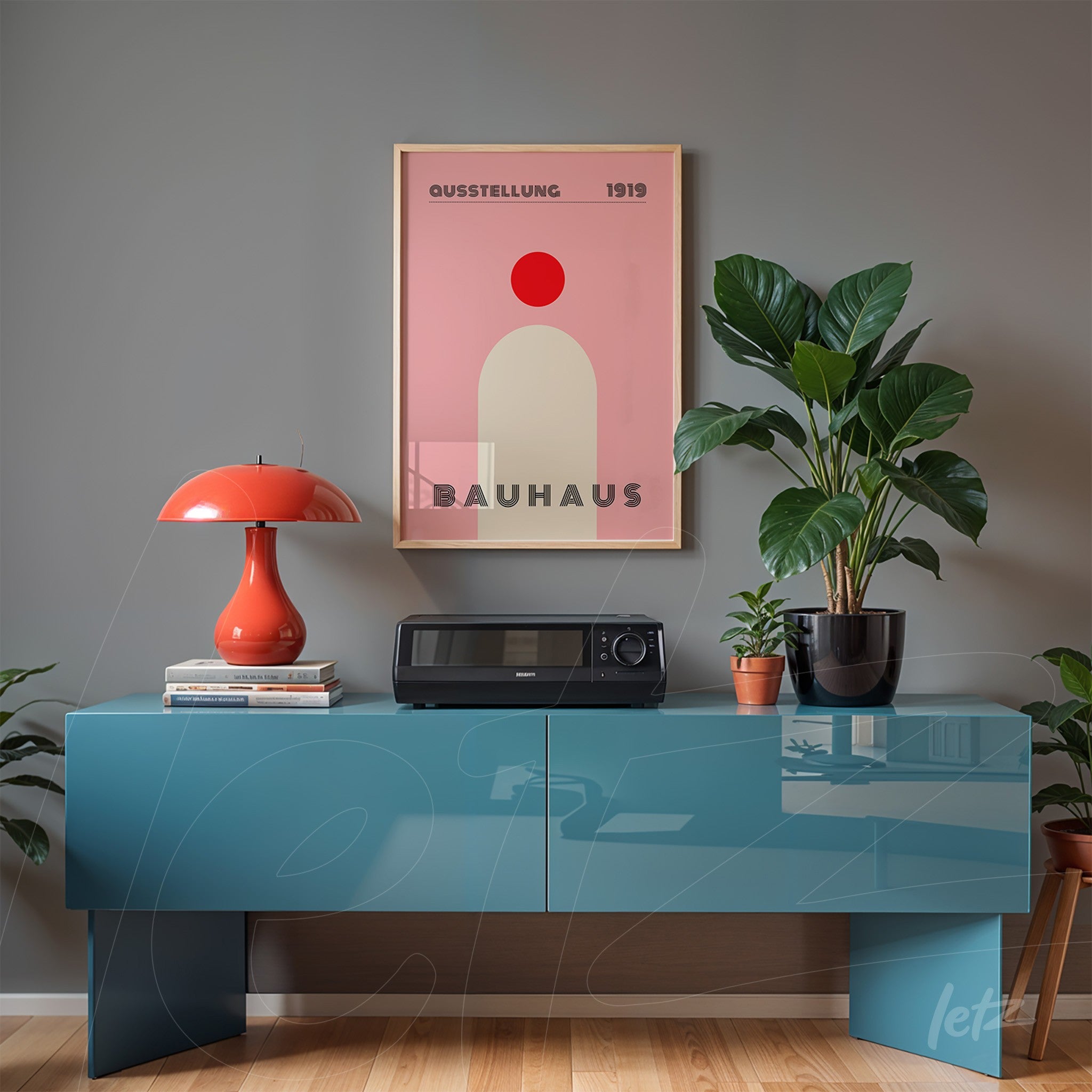 minimalist geometric art with red tones in a light wood frame on a light gray wall