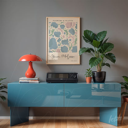 framed wall art featuring pastel floral illustration displayed against a gray wall in a contemporary setting
