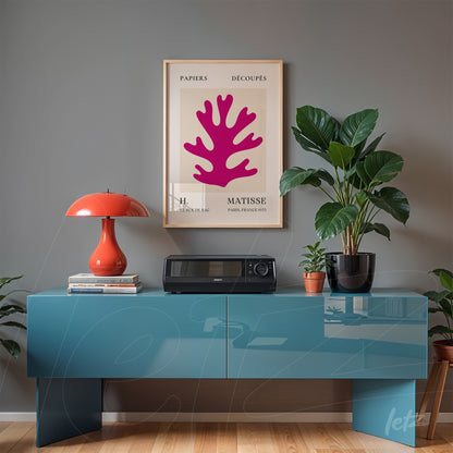 framed artwork by Matisse featuring a pink coral reef, displayed in a modern minimalistic room