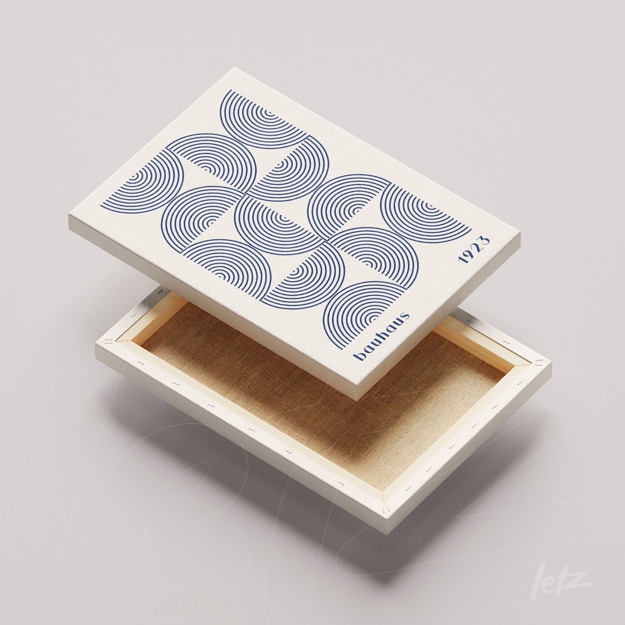 box of art with geometric design of curved blue lines on a white background, showing the empty interior