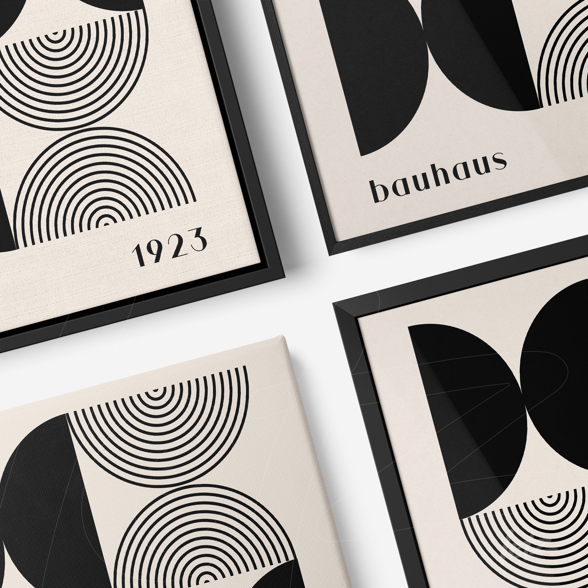 four bauhaus style artworks with black geometric shapes on light beige background, shown in black frames