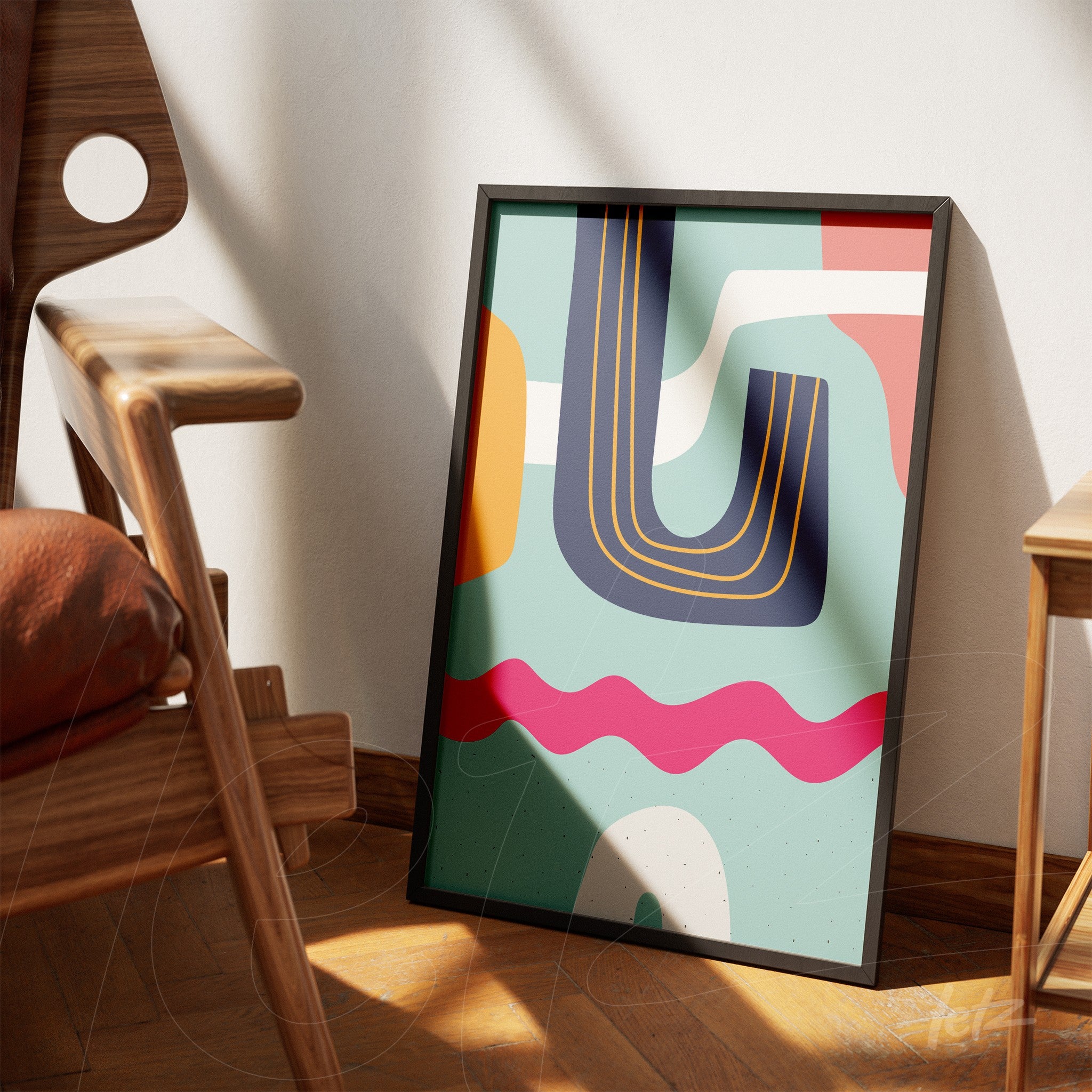 ```json
{
  "alt": "quadro com arte abstrata boho em tons vibrantes e moldura preta apoiado em chão de madeira ao lado de cadeira moderna",
  "alt_en": "framed boho abstract art in vibrant colors leaning on wooden floor next to a modern chair"
}
```