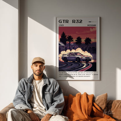 framed retro art of Nissan GTR R32 with white frame, featuring palm trees and a colorful sky backdrop