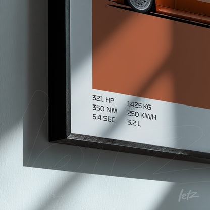 framed graphic art of an orange car displaying technical specifications in the bottom corner against a brown background