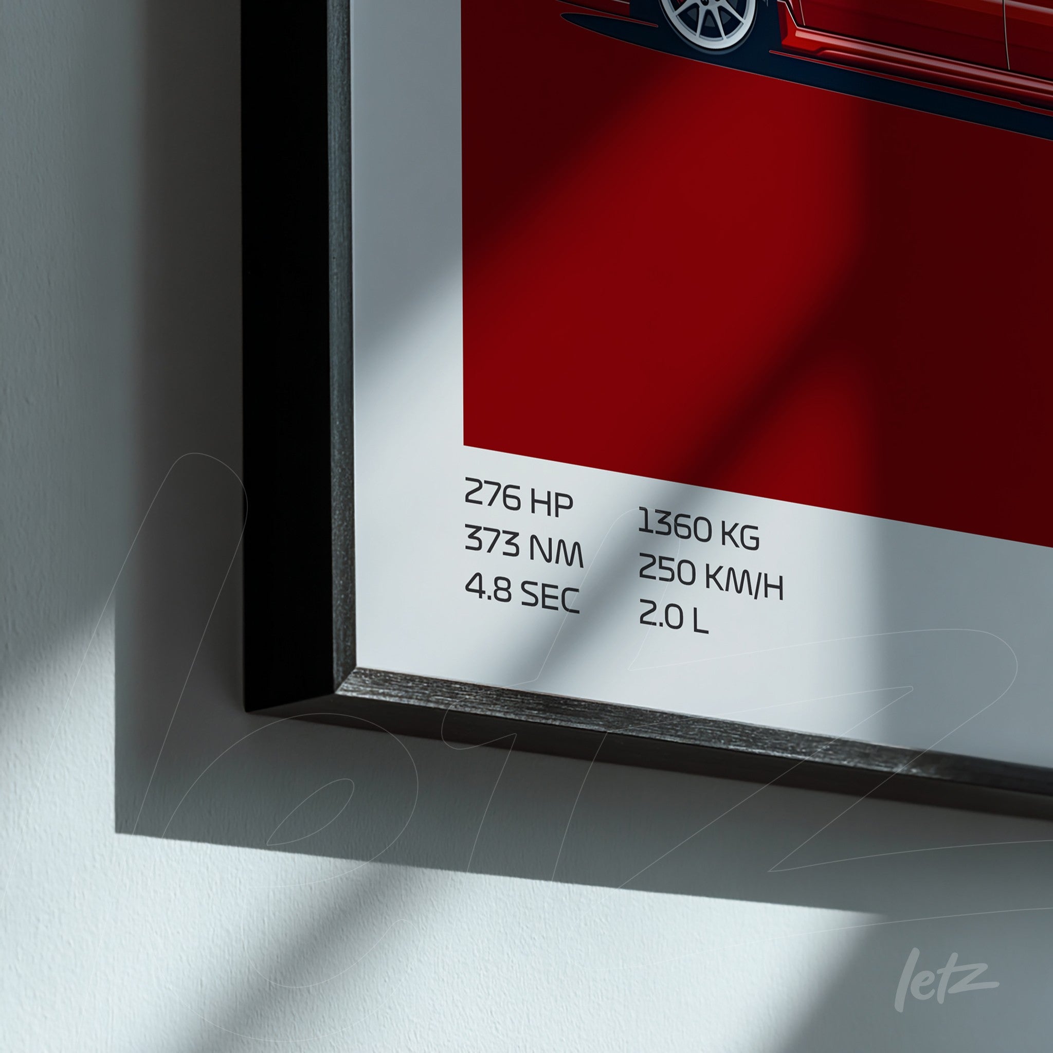 framed wall art featuring a red sports car on a red background with black technical specifications