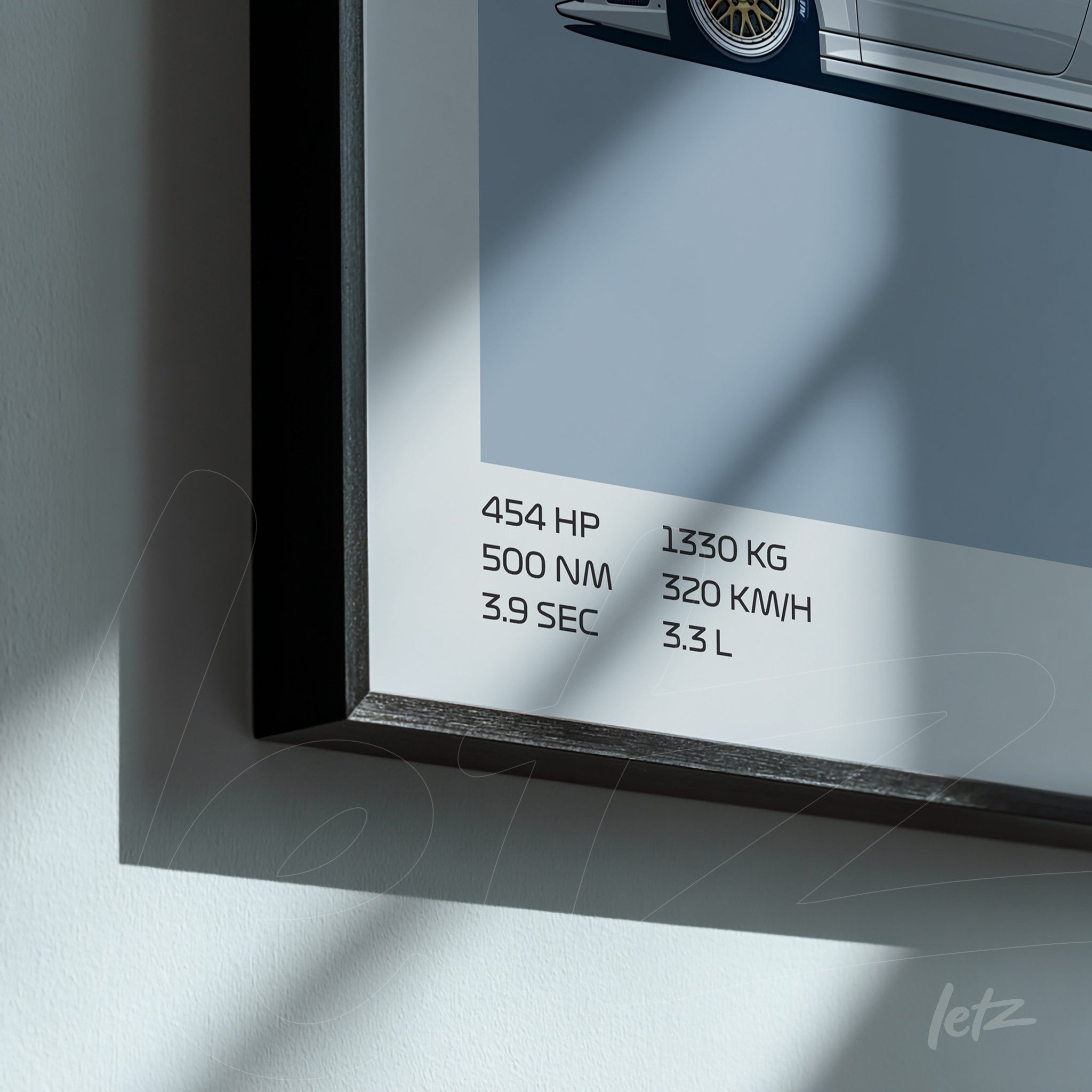 framed wall art featuring a minimalist illustration of a sports car with black frame and technical details in text